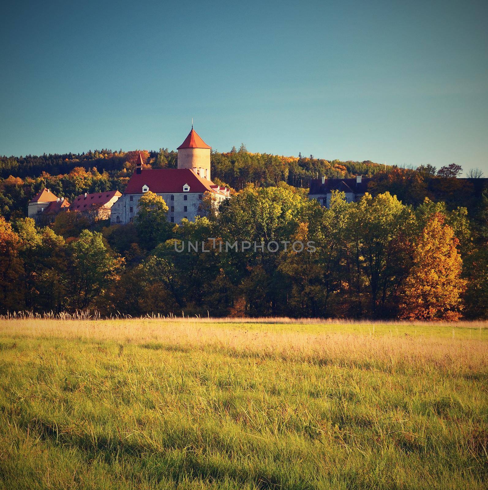 Beautiful Autumn Landscape with Veveri Castle. Natural colorful scenery with sunset. Brno dam-Czech Republic-Europe.