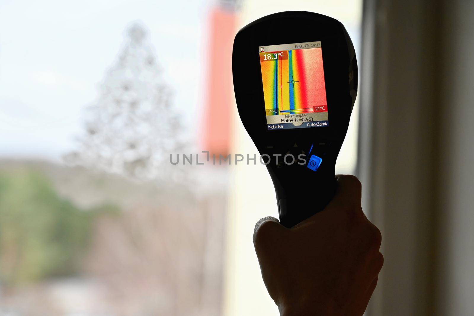 Hand thermal imaging camera to check temperature .