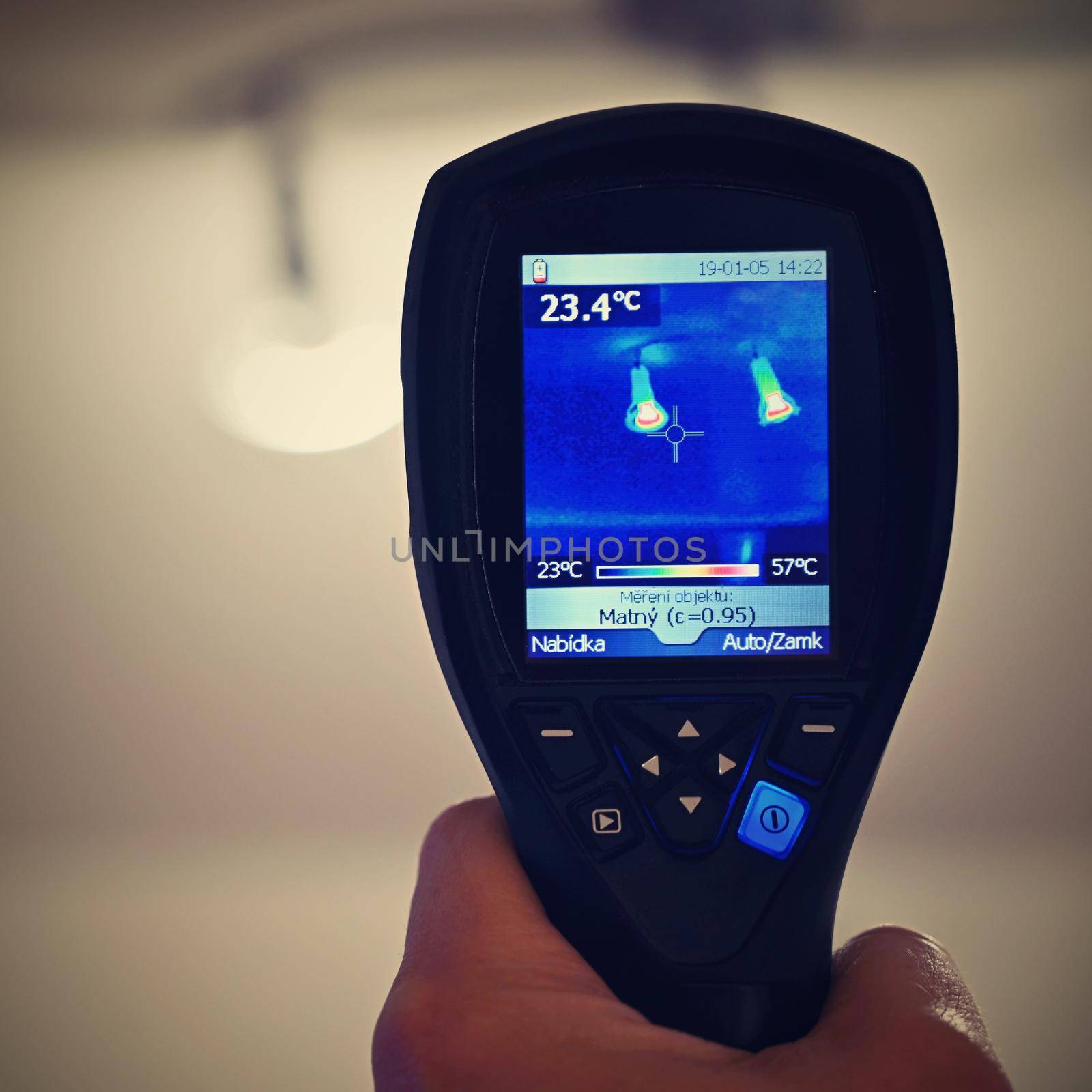 Hand thermal imaging camera to check temperature .