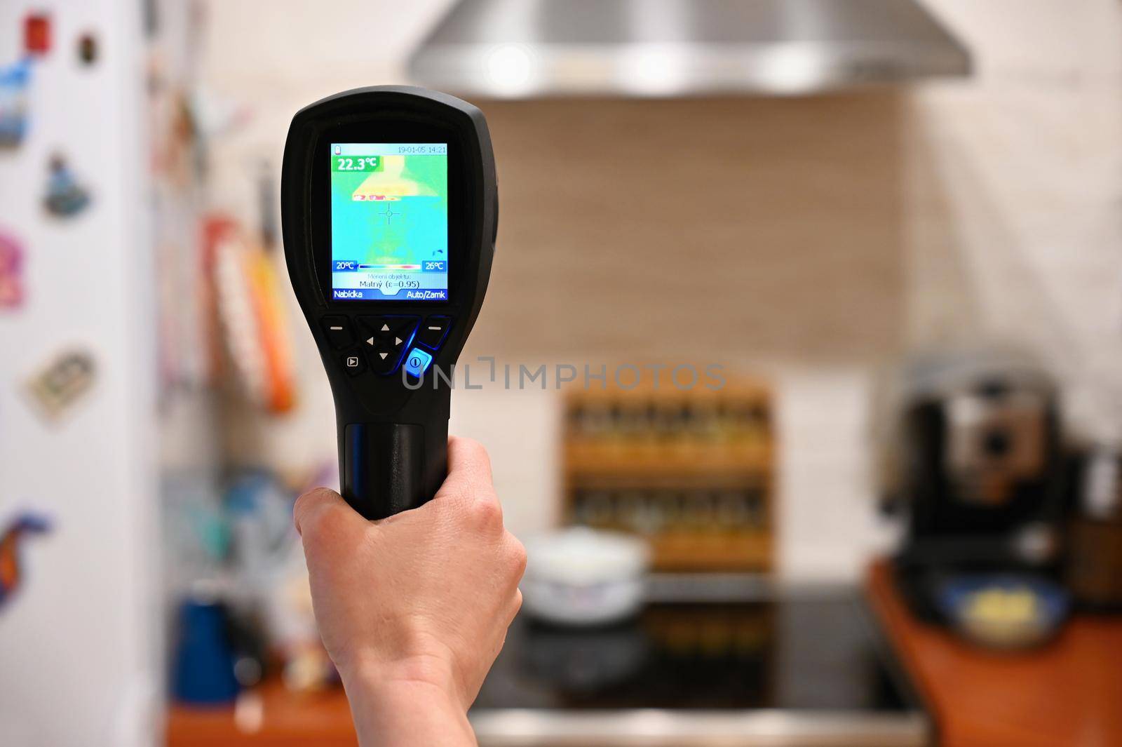 Hand thermal imaging camera to check temperature .