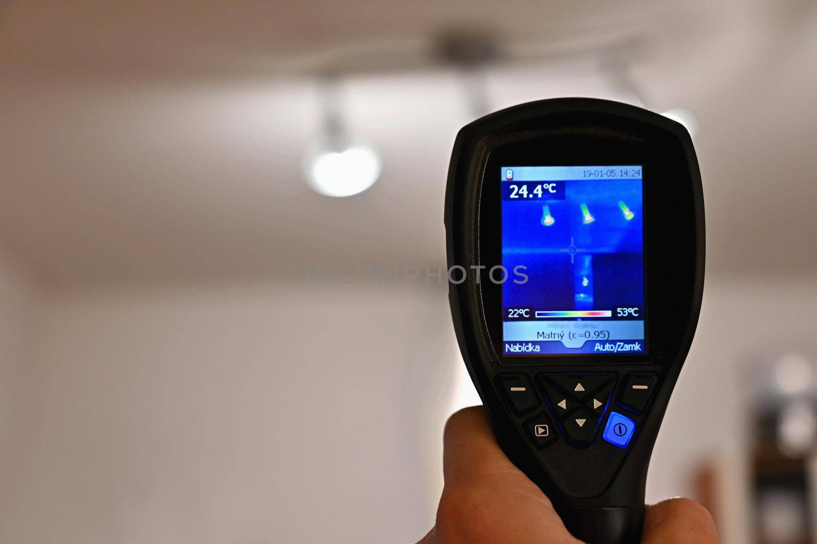 Hand thermal imaging camera to check temperature .