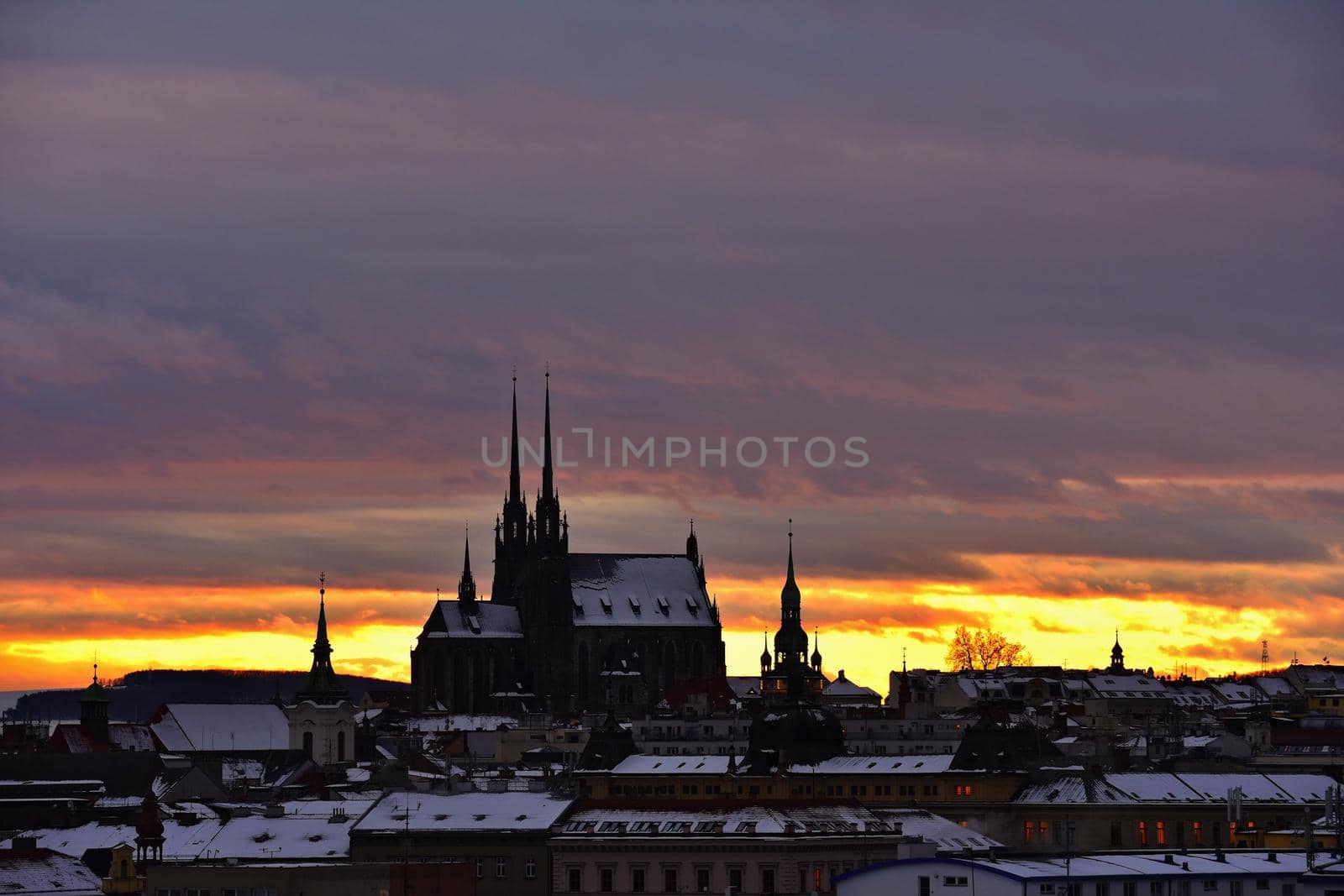 Petrov.Cathedral of Saints Peter and Paul in Brno Czech Republic. Night photo of beautiful old architecture at sunset. by Montypeter