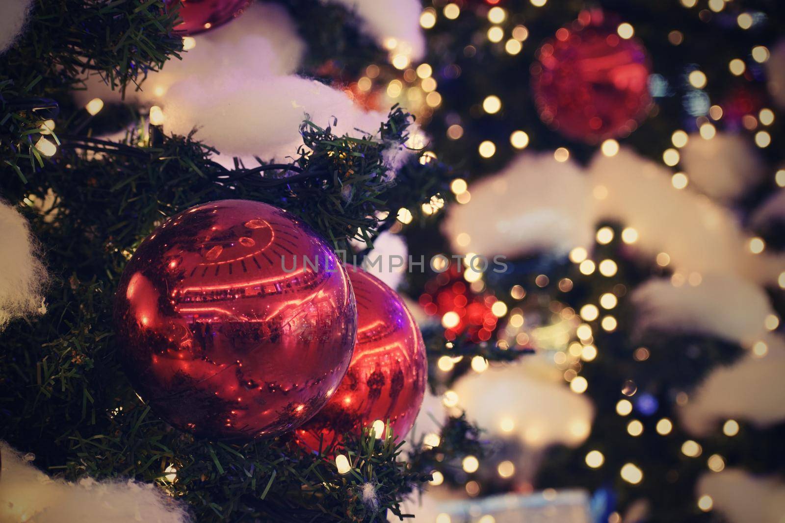 Christmas and New Year holidays background, winter season. Christmas greeting card with ornaments and lights for tree.