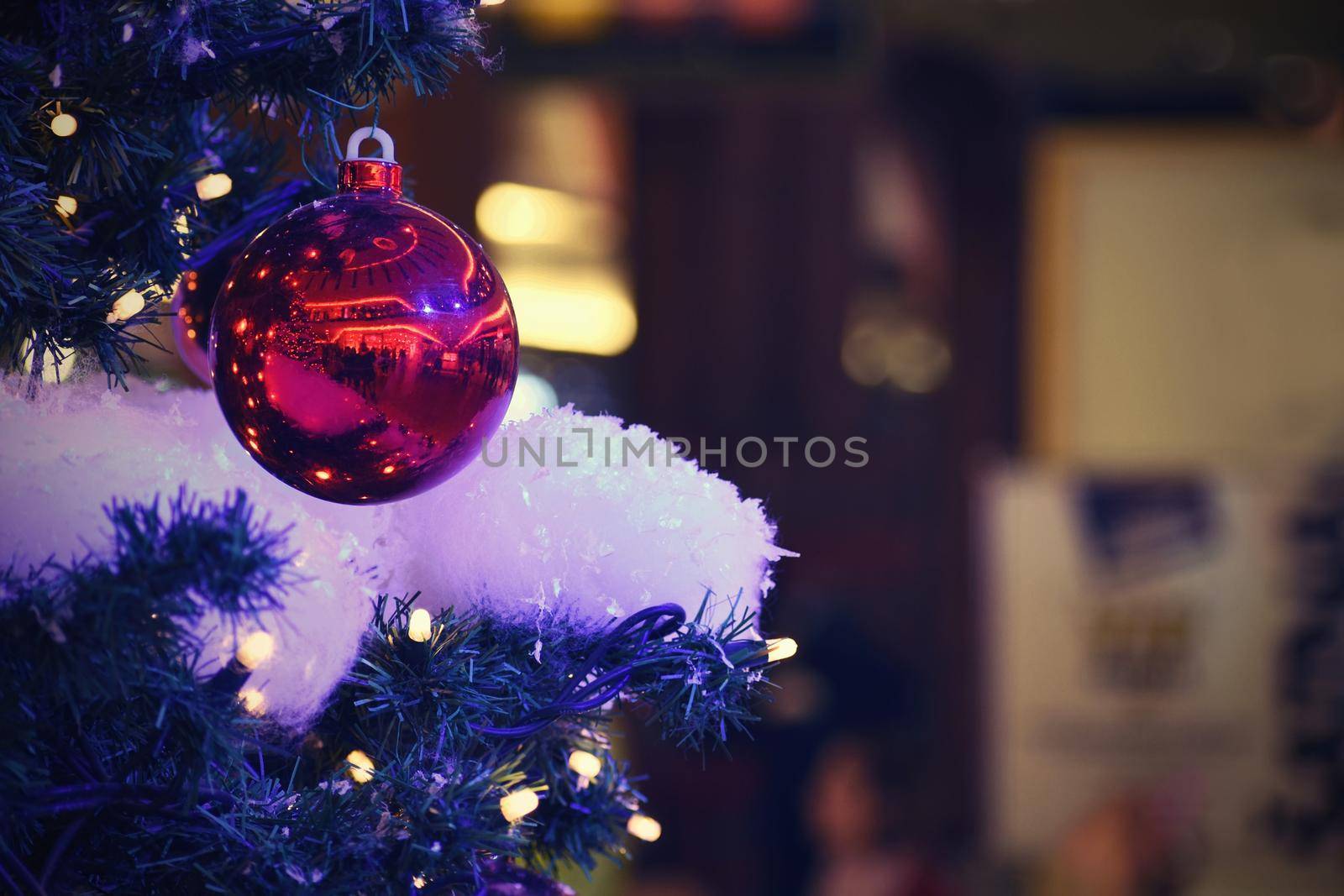 Christmas and New Year holidays background, winter season. Christmas greeting card with ornaments and lights for tree.