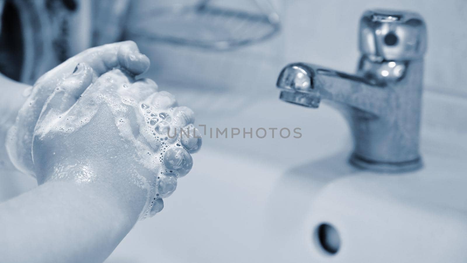 Thorough hand washing with disinfectant soap. Quarantine - domestic hygiene. Measures against coronavirus disease. (COVID-19)