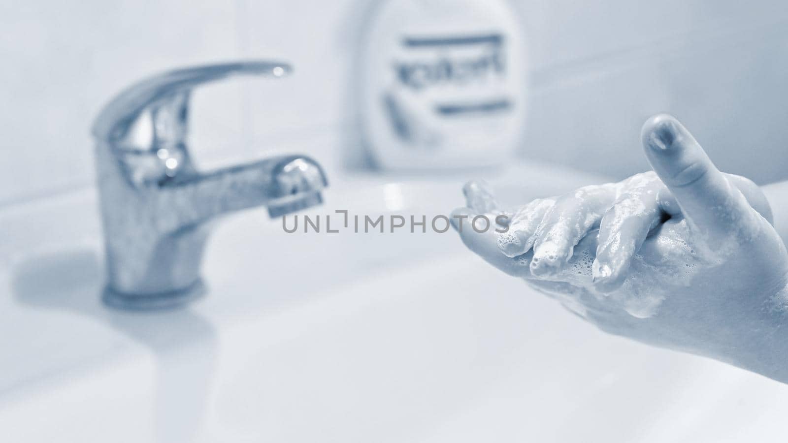 Thorough hand washing with disinfectant soap. Quarantine - domestic hygiene. Measures against coronavirus disease. (COVID-19)
