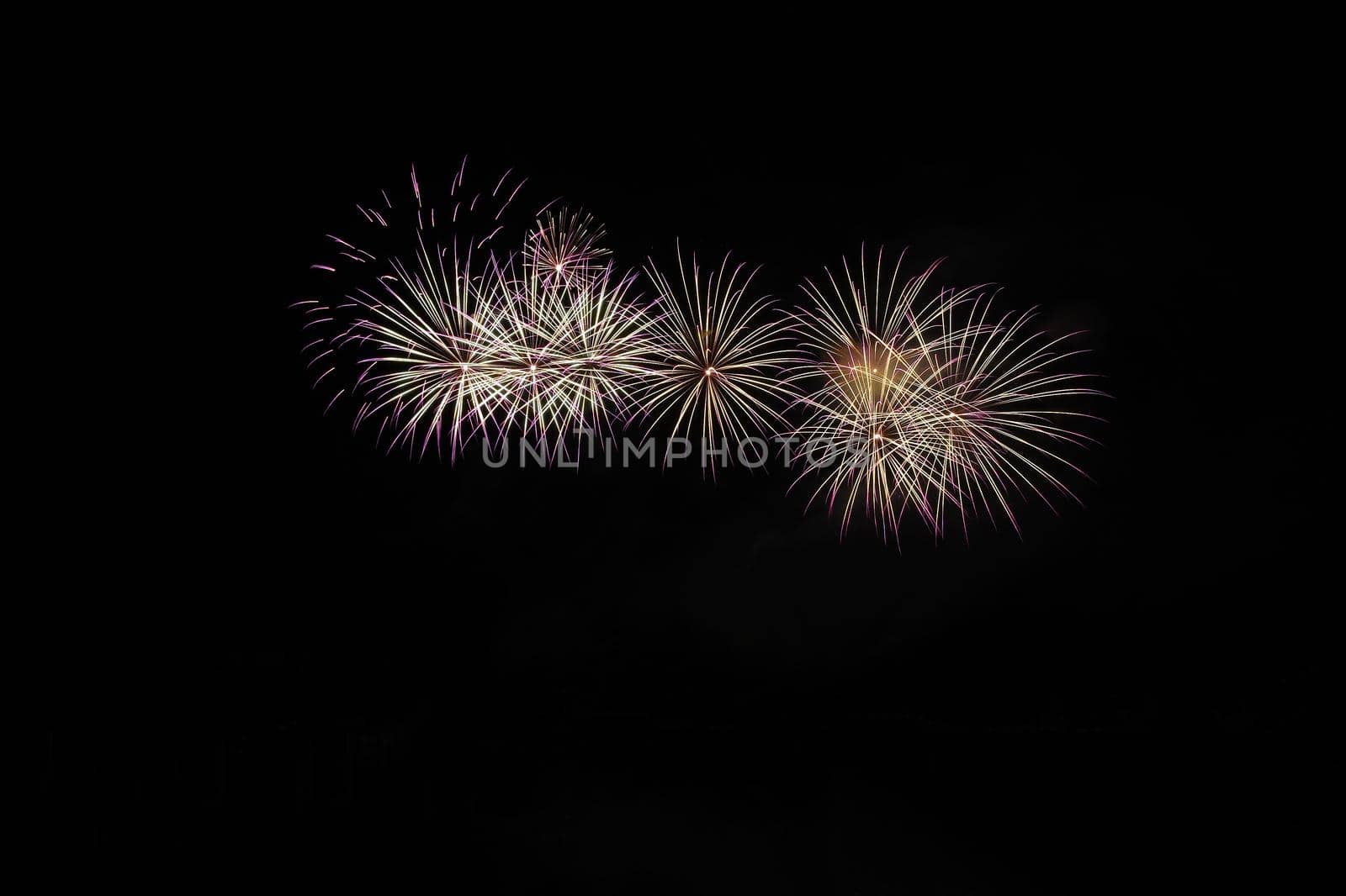 Beautiful colorful fireworks with reflections in water. Brno dam, the city of Brno-Europe. International Fireworks Competition.