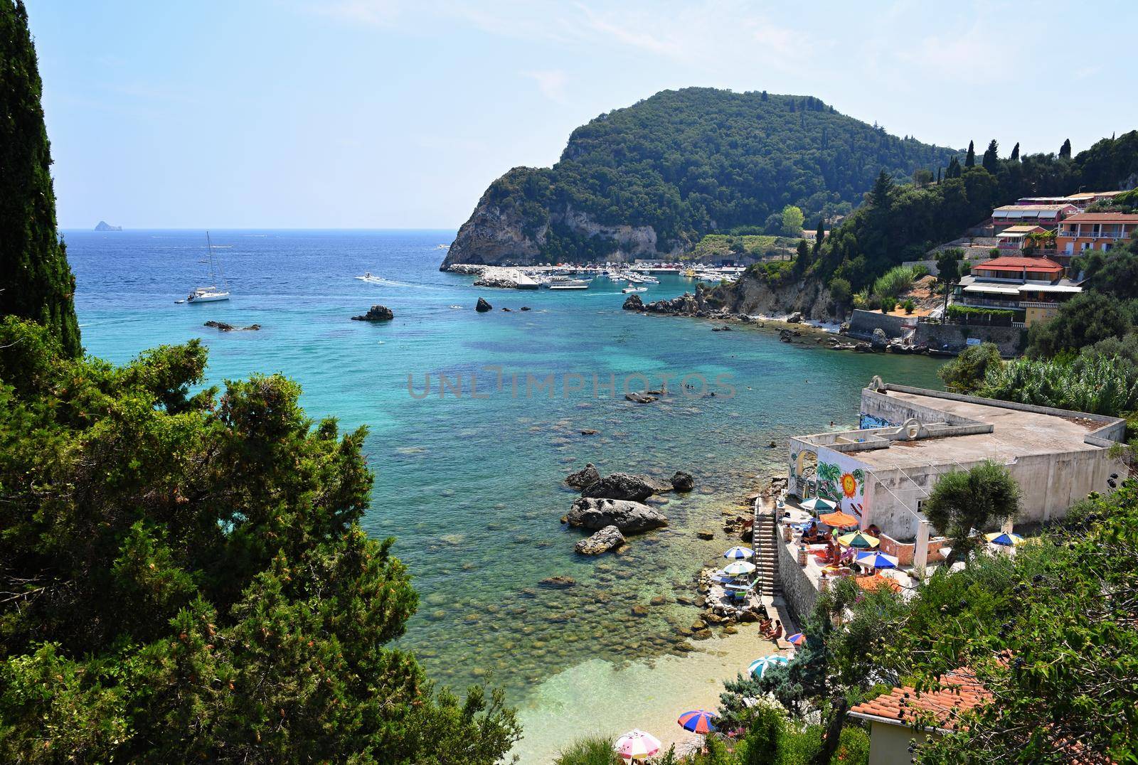 Beautiful Paleokastrica beach landscape on Corfu, Kerkyra, Greece. Beautiful colorful island for summer holidays and travel.