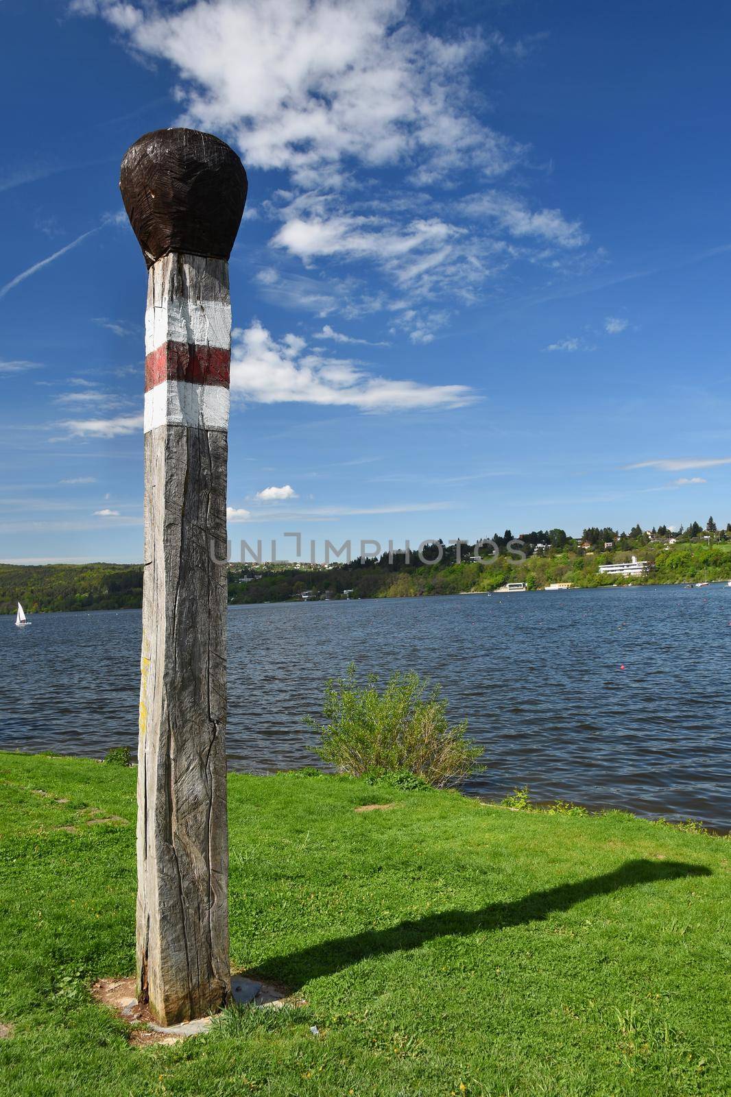 Big match. Brno dam. South Moravia. Czech Republic Europe. Recreational area of entertainment and sports. Beautiful countryside with nature, clear water and sky with sun and clouds. by Montypeter