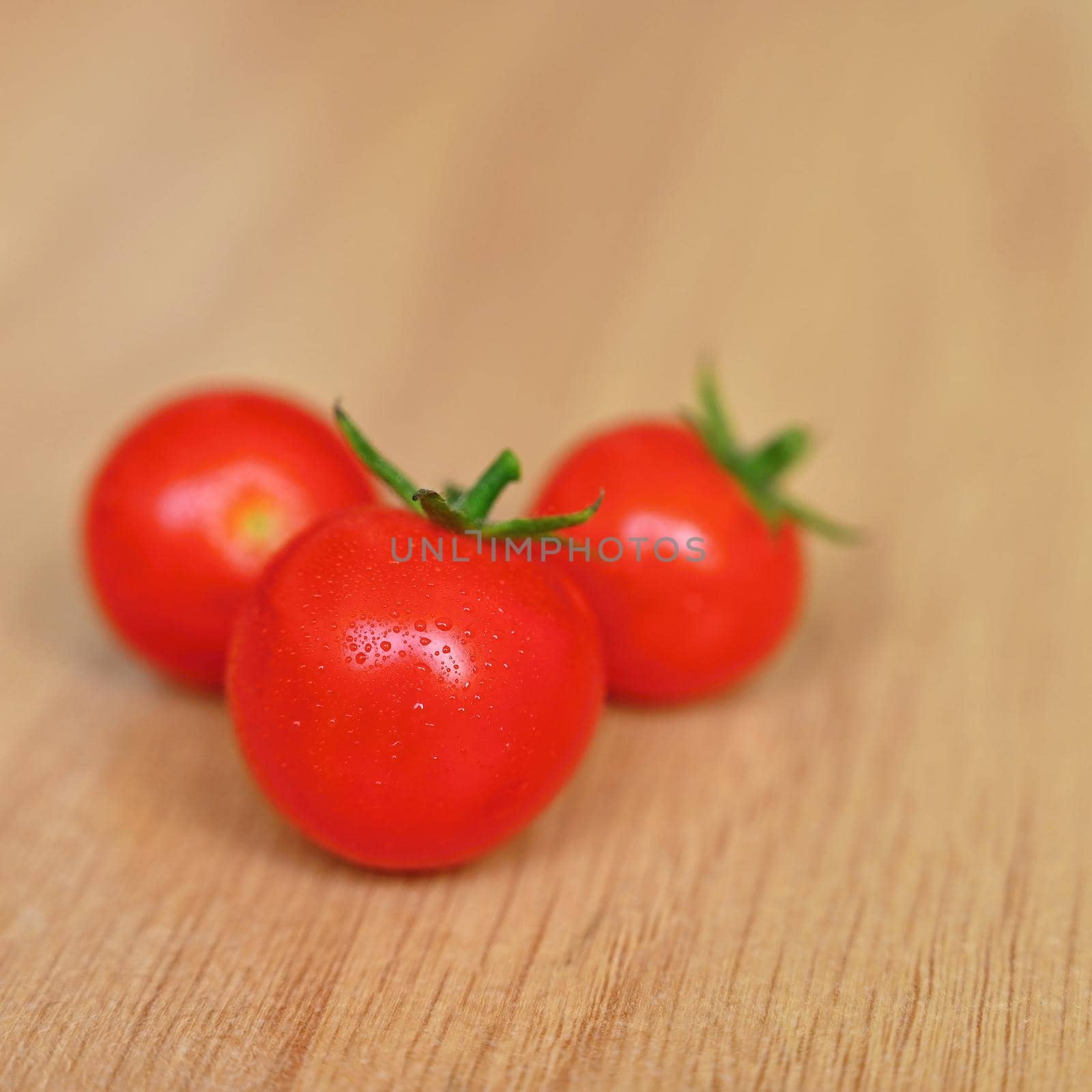 Beautiful small cherry fresh tomatoes. Healthy vegetables - organic food.