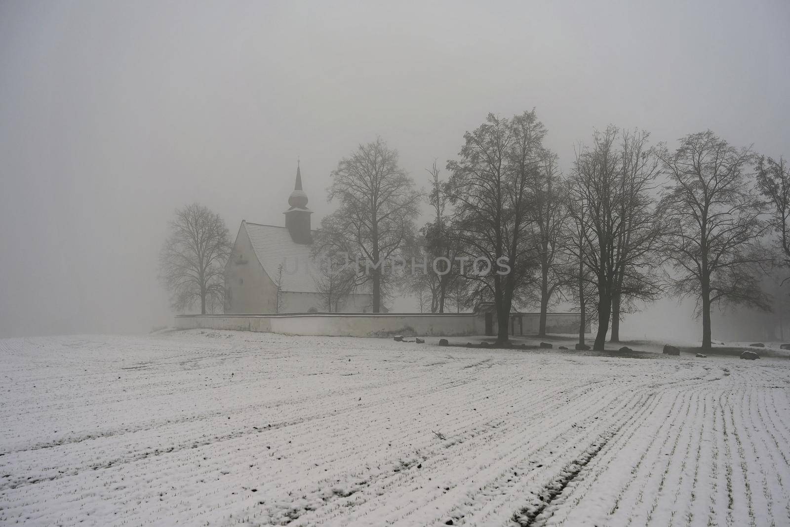 Winter landscape with a beautiful chapel near castle Veveri. Czech Republic city of Brno. The Chapel of the Mother of God.