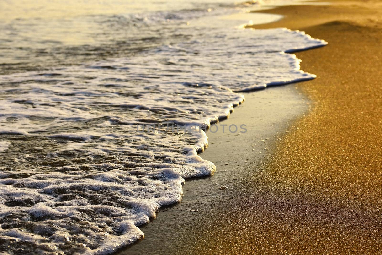 Beautiful clean sea and waves. Summer background for travel and holidays. Greece Crete.. Amazing scenery on the beach. 