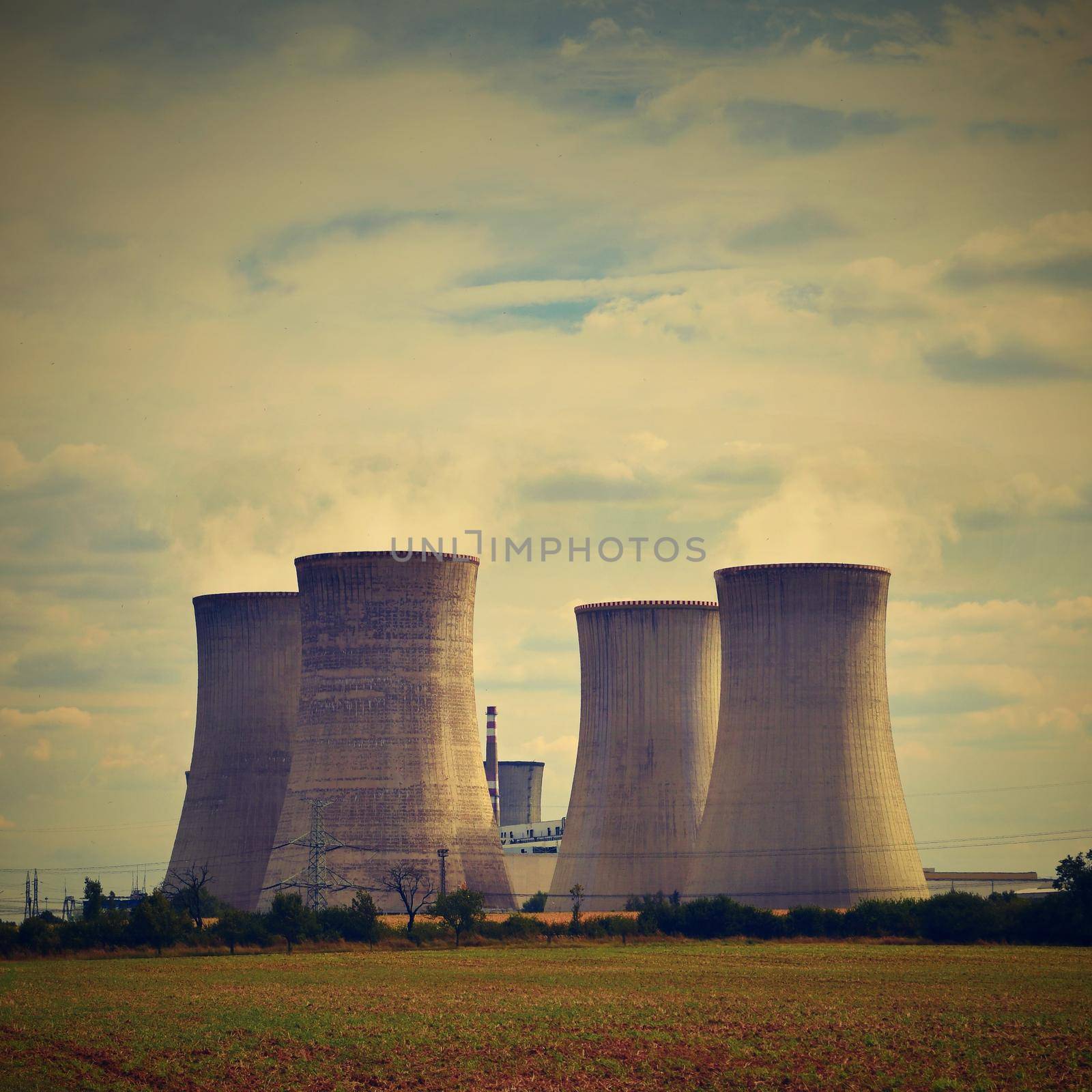 Nuclear plant . Landscape with power station chimneys. Dukovany Czech Republic. by Montypeter