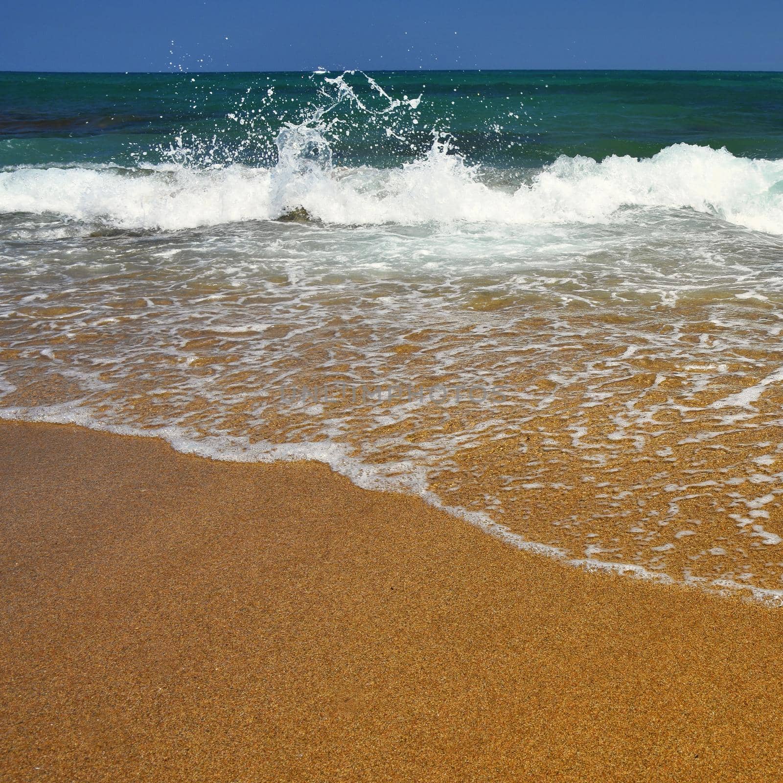 Beautiful clean sea and waves. Summer background for travel and holidays. Greece Crete.. Amazing scenery on the beach. 
