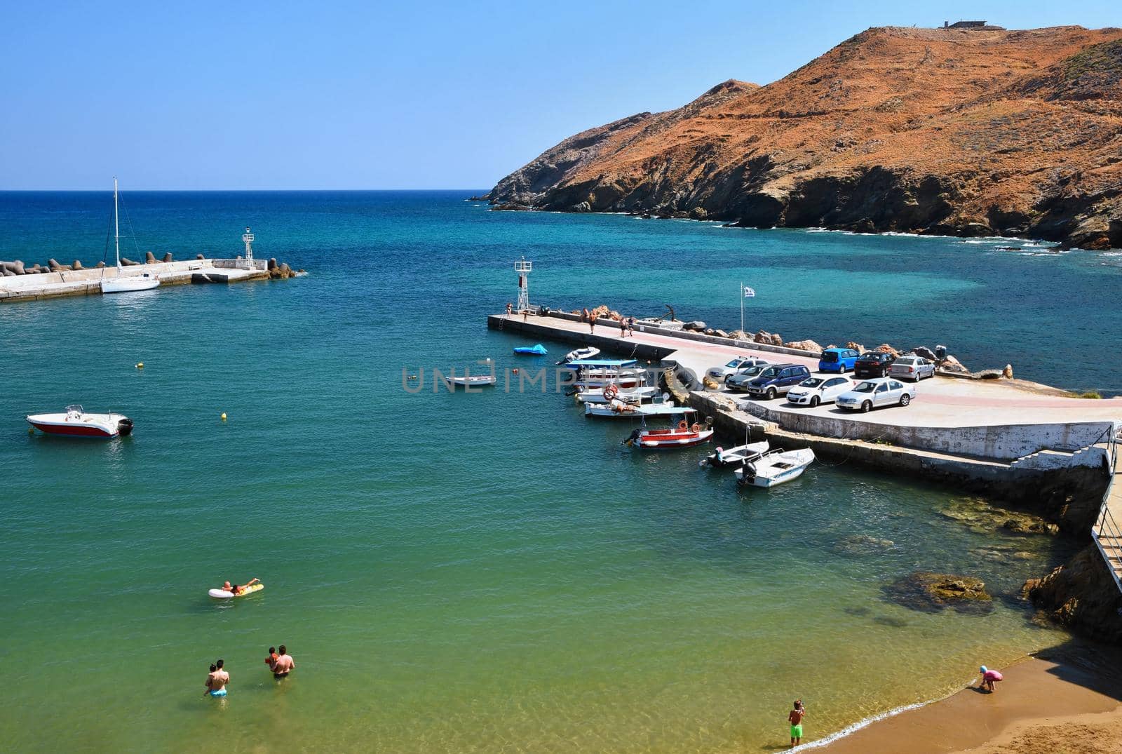 Traditional beautiful Greek village of Panormos on the island of Crete. Summer background for travel and holidays.