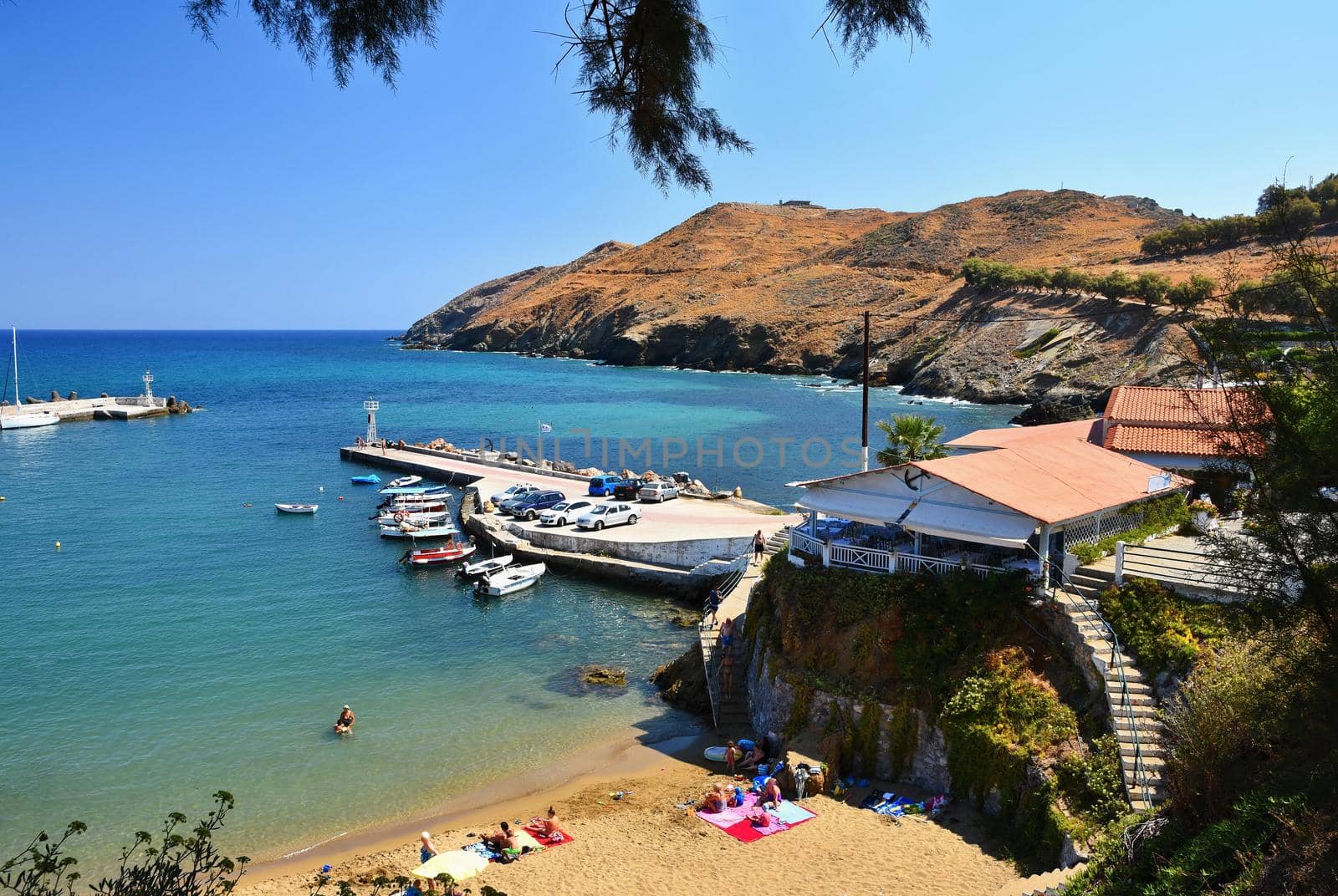 Traditional beautiful Greek village of Panormos on the island of Crete. Summer background for travel and holidays.