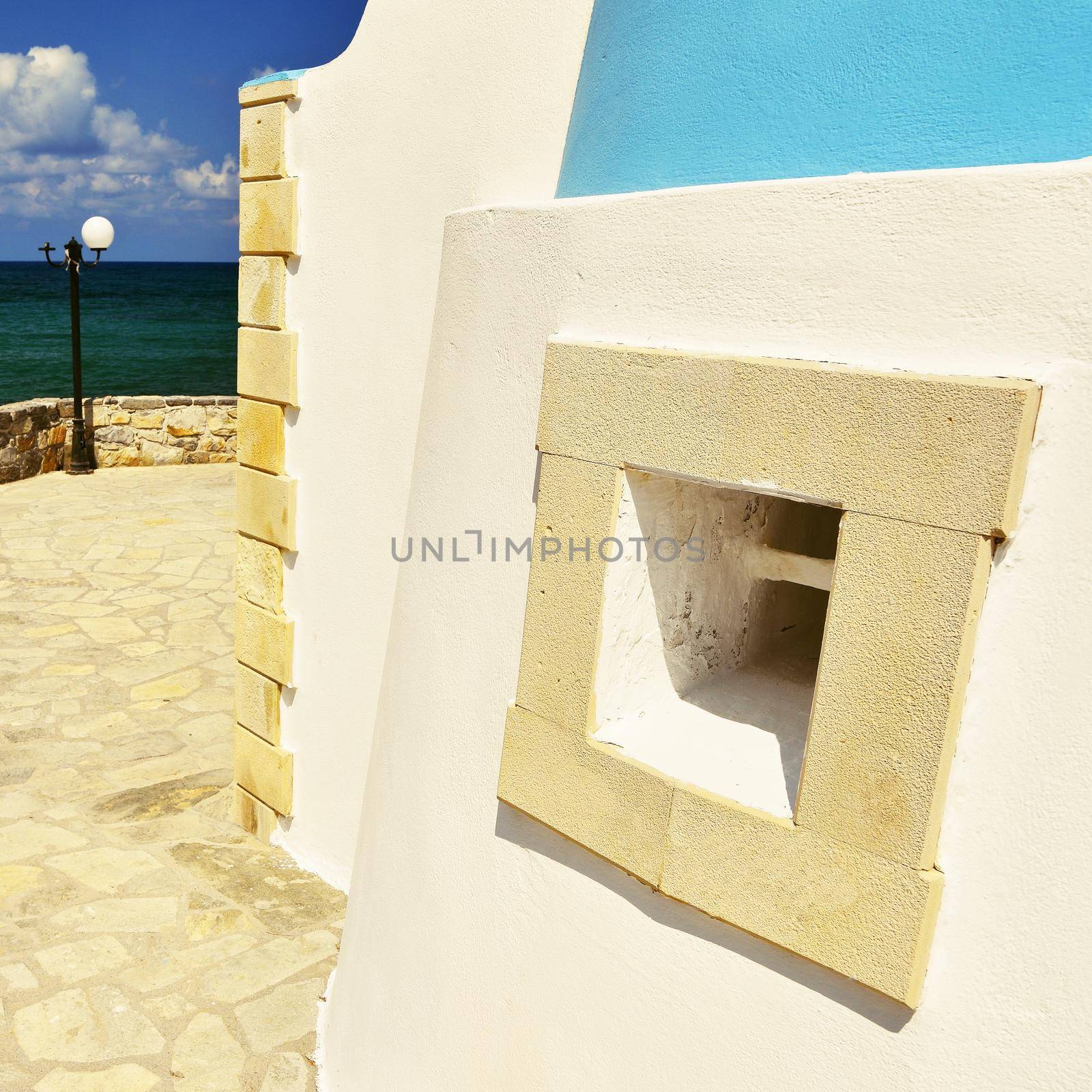 Beautiful little Greek chapel at sunset on the island of Crete - Greece. by Montypeter