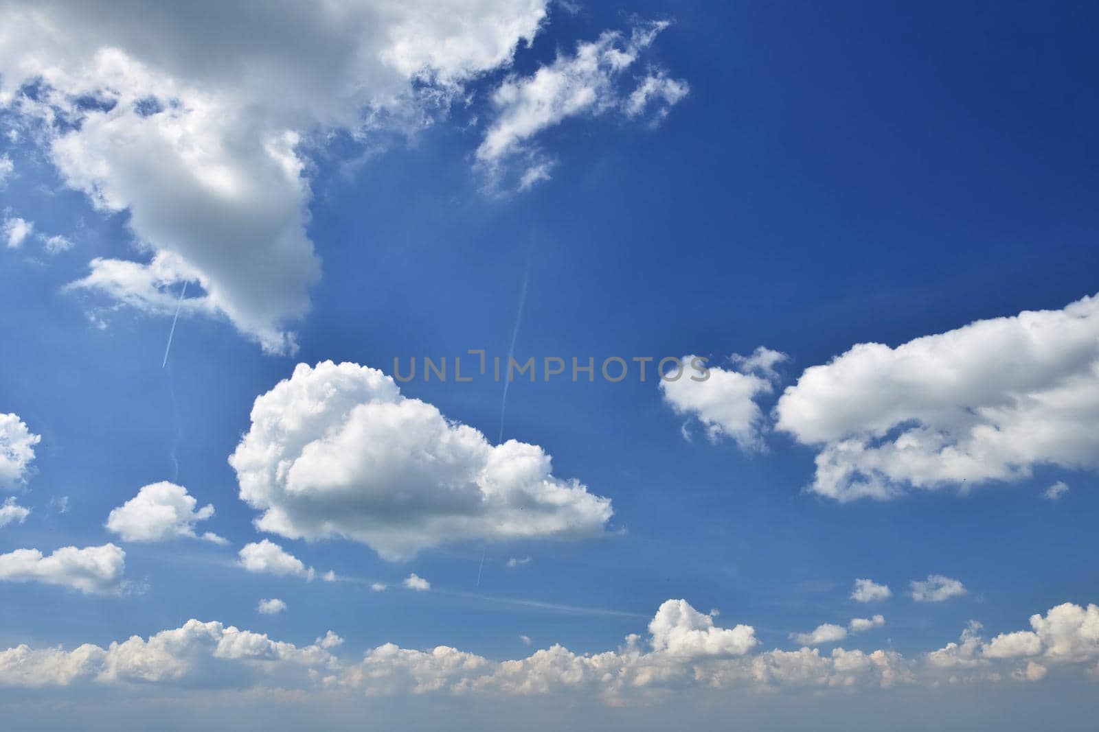 Sky with clouds. Beautiful blue natural background.