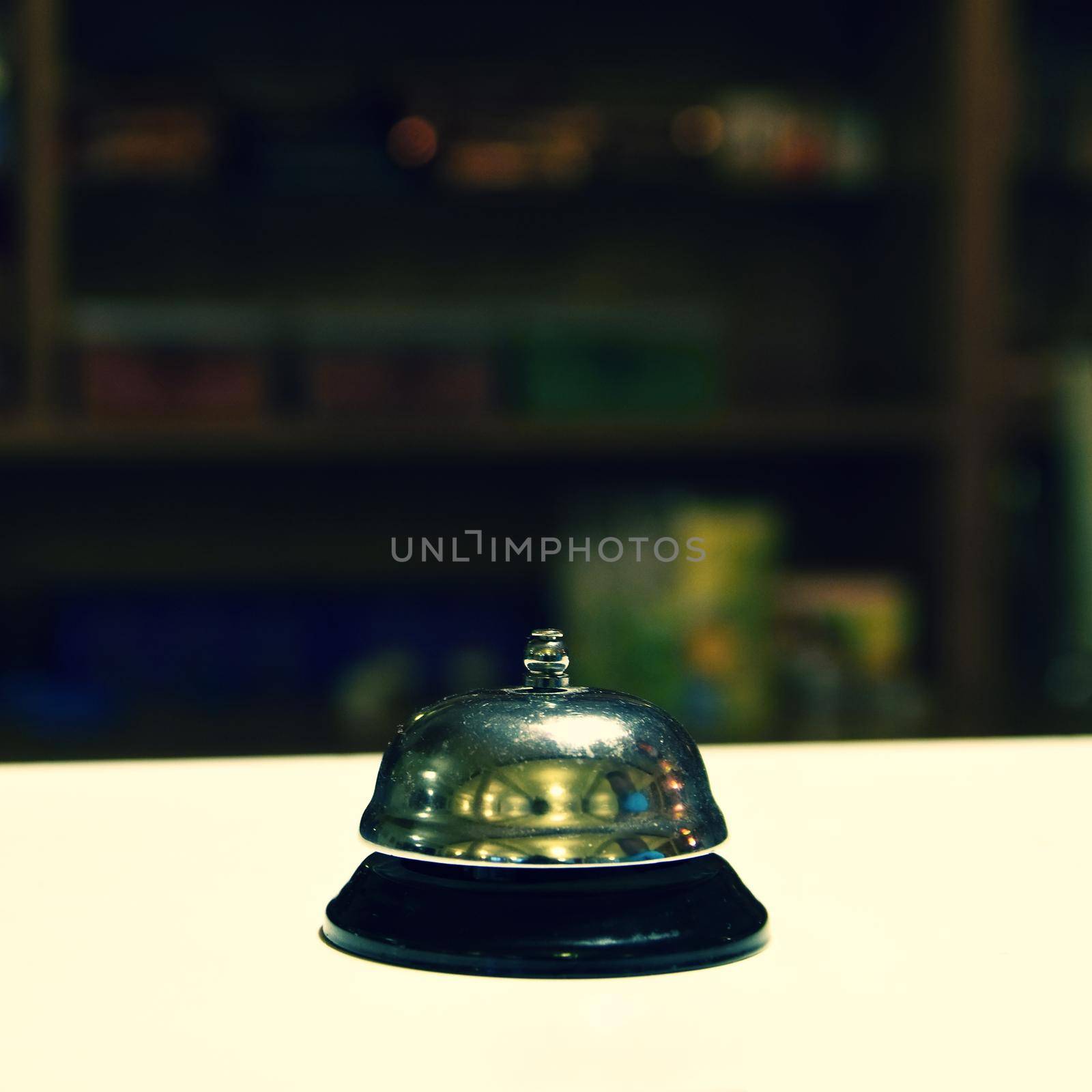 Receptionist bell. Blurred background reception or restaurant. by Montypeter