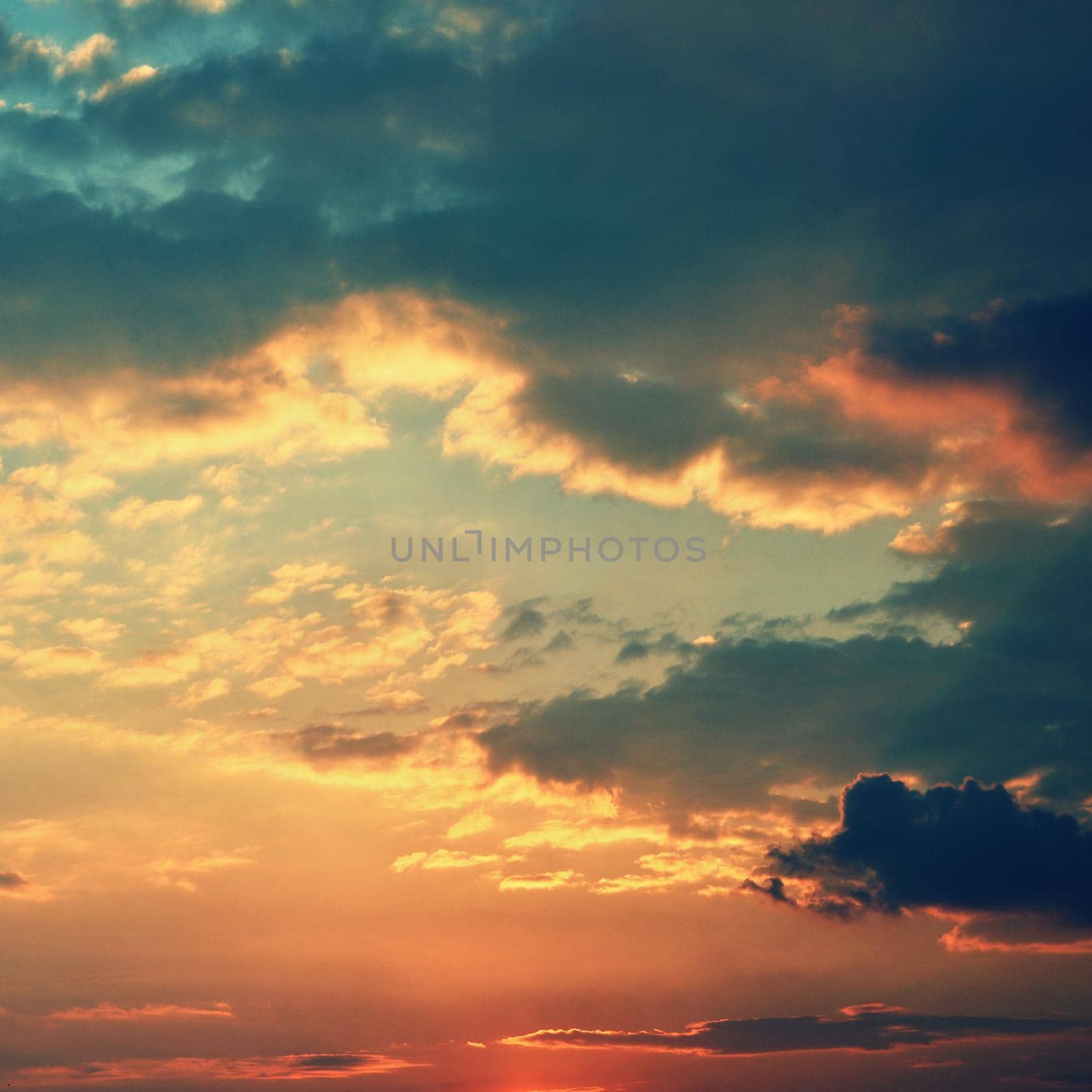 Beautiful sunset - sunrise with clouds. Sky with clouds. Colorful natural background.