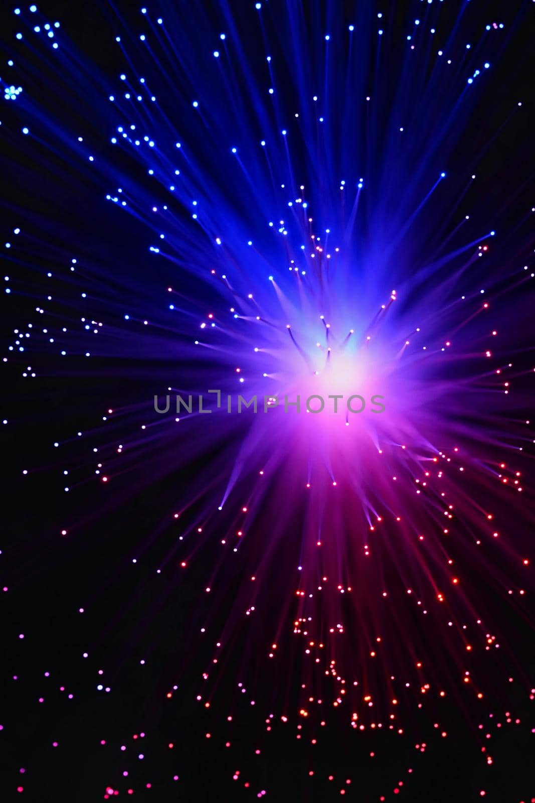 Colorful abstract background. Lamp with optical fibers. by Montypeter