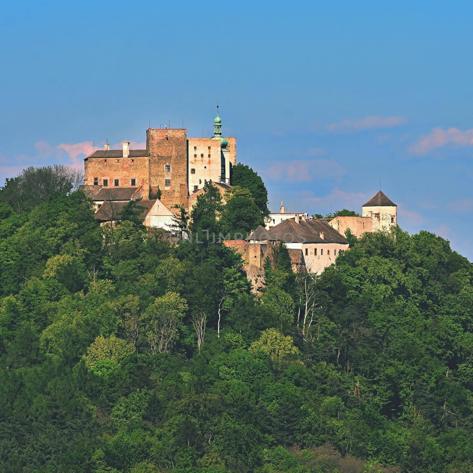 Beautiful old castle Buchlov. South Moravia-Czech Republic-Europe.
Spring landscape with forests, castle and blue sky.