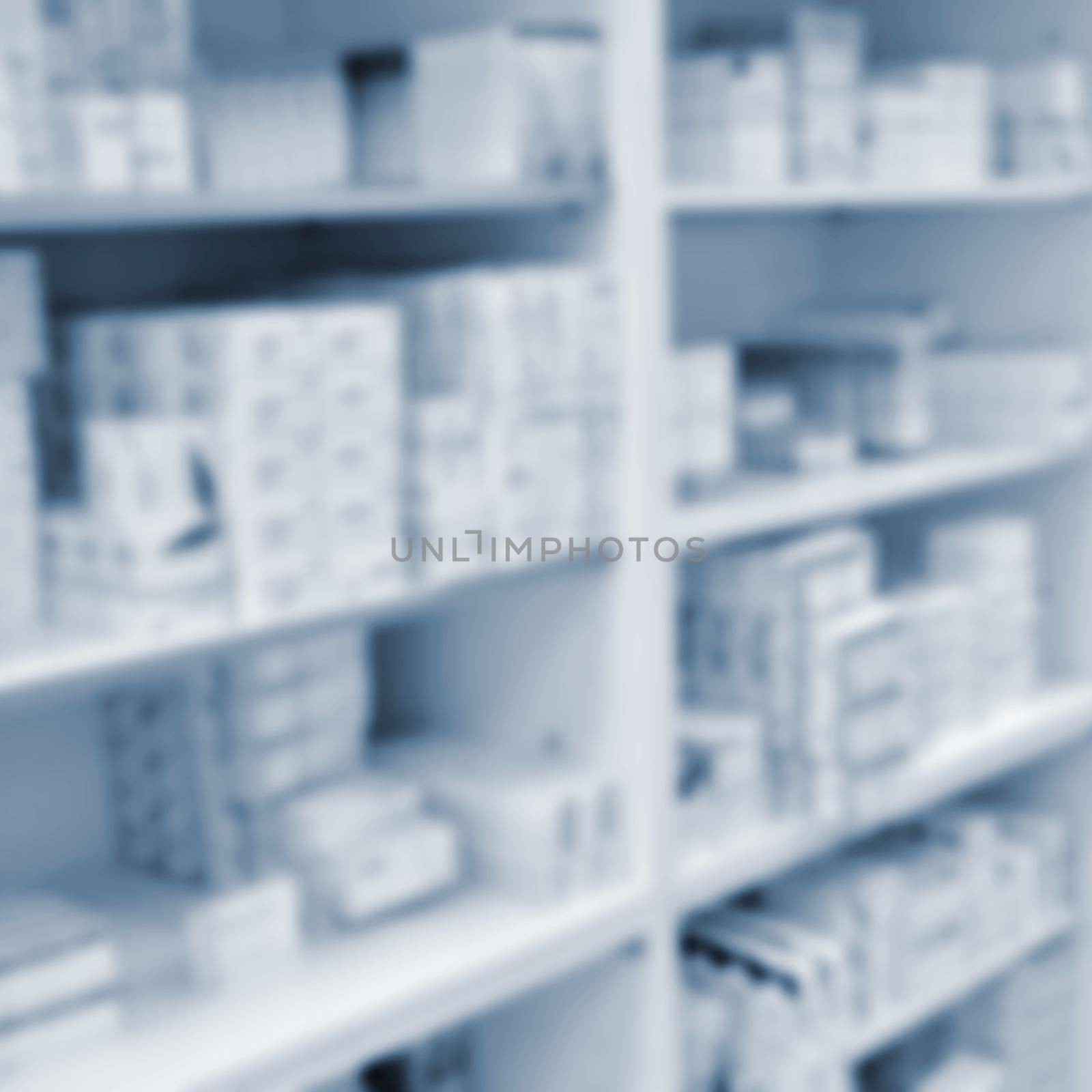 Pharmacy store drugs shelves interior blurred background by Montypeter