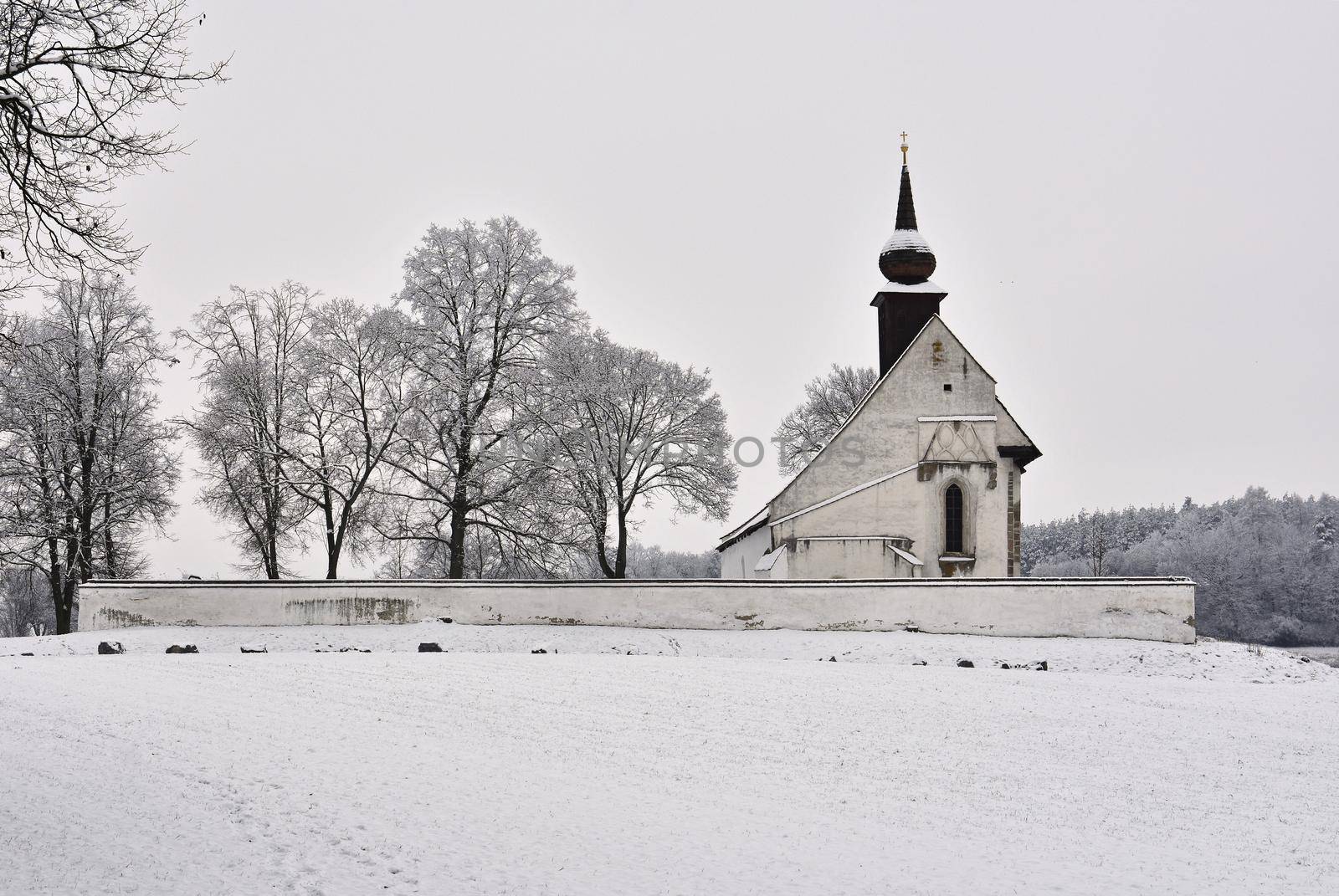 Winter landscape with a beautiful chapel near castle Veveri. Czech Republic city of Brno. The Chapel of the Mother of God.