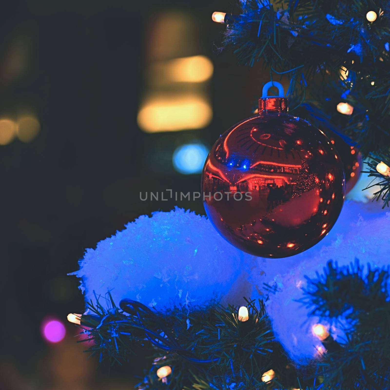 Colorful christmas Decoration. Winter holidays and traditional ornaments. Lighting chains-bulbs for seasonal background.