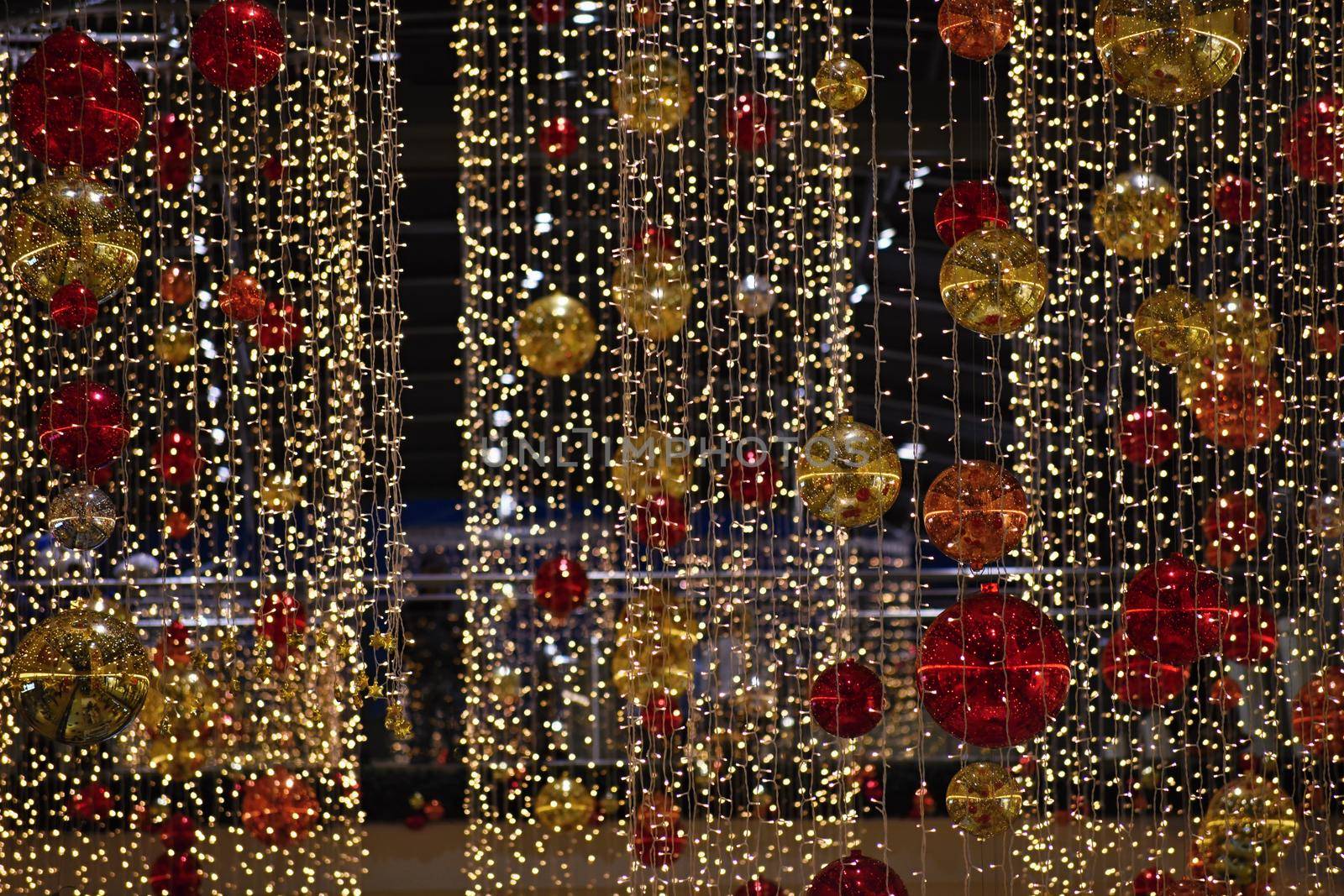 Colorful christmas Decoration. Winter holidays and traditional ornaments. Lighting chains-bulbs for seasonal background.