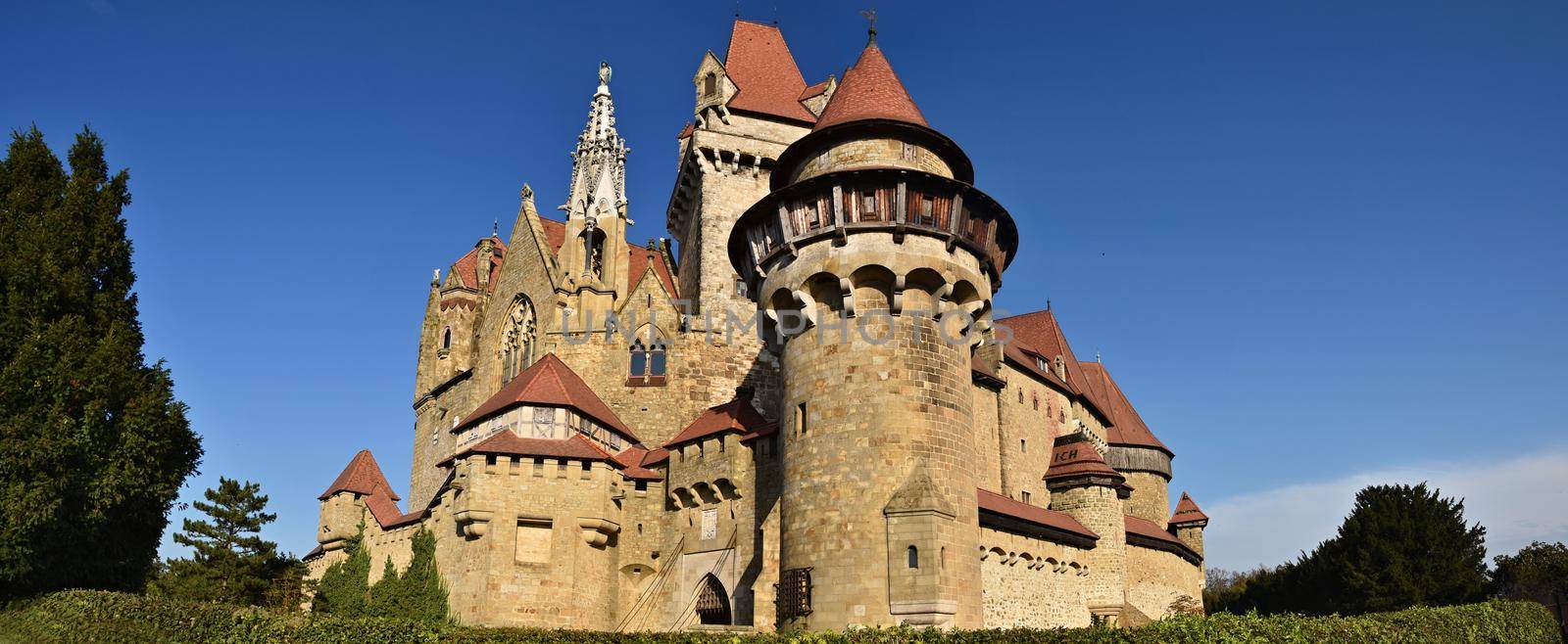 Beautiful medieval Kreuzenstein castle in Leobendorf village. Near Vienna, Austria - Europe. Autumn day. by Montypeter