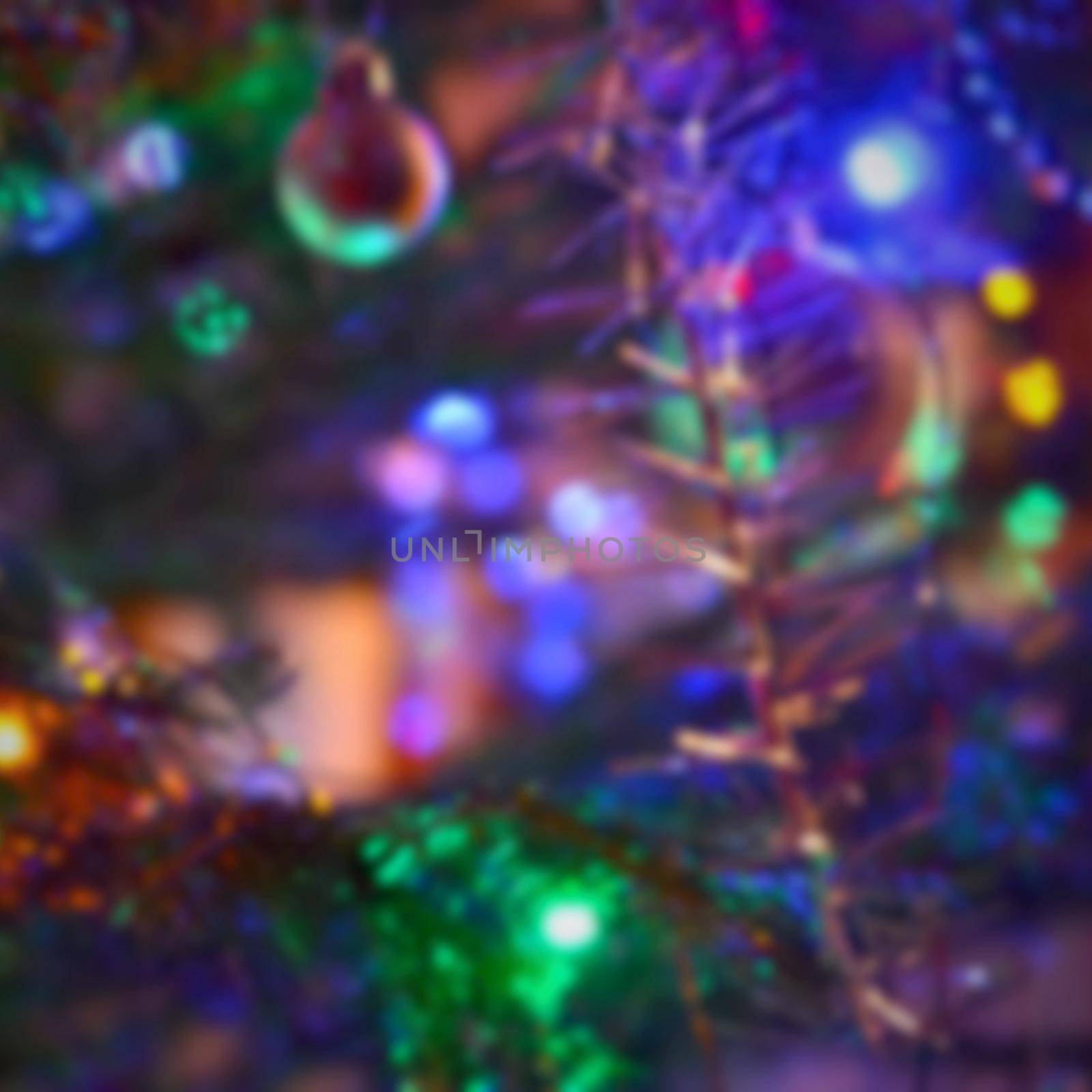 Blurred xmas background, christmas texture and background from color lights.