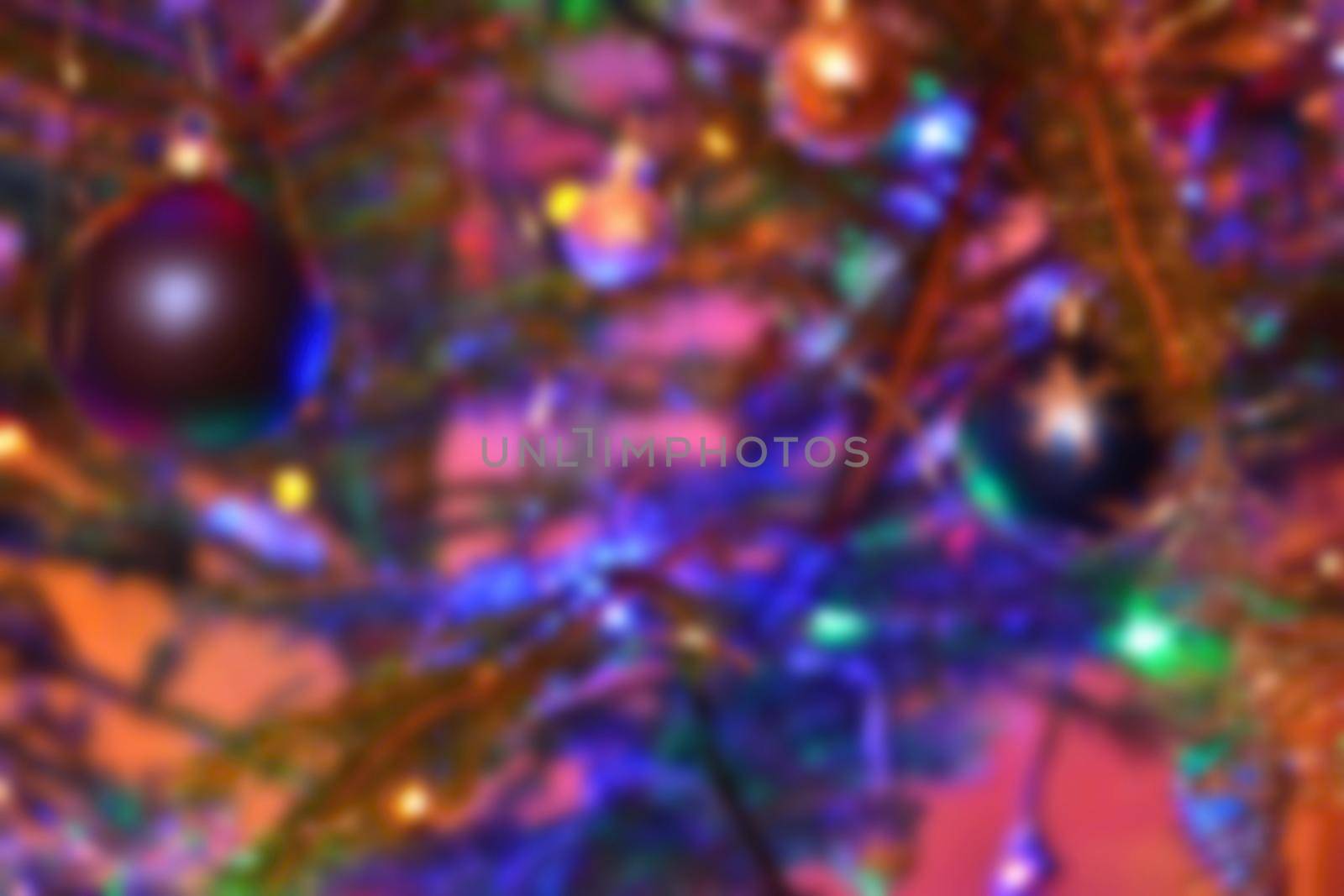 Blurred xmas background, christmas texture and background from color lights.