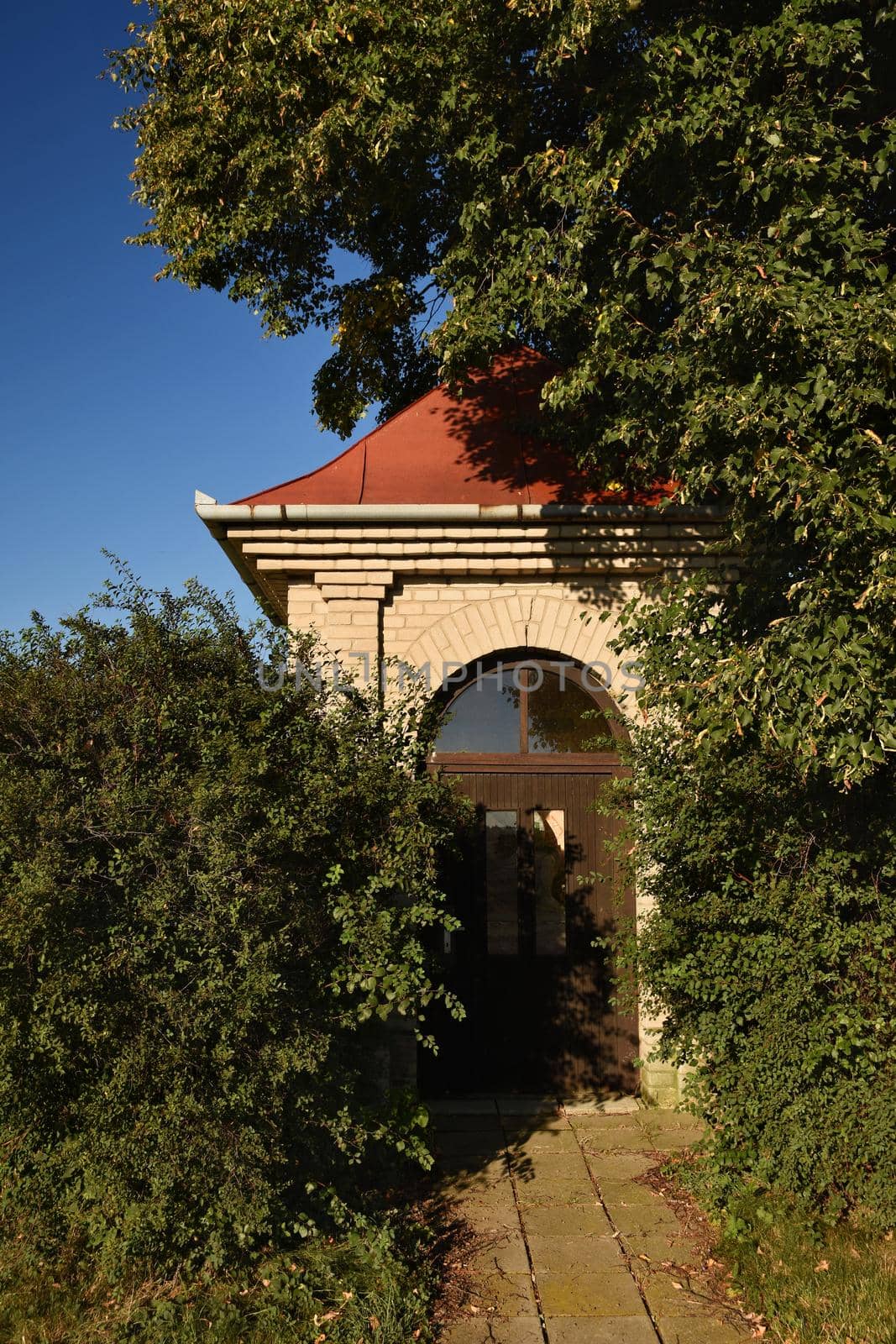 Beautiful little chapel. Europe - Czech Republic. South-Moravian region. Beautiful landscape with sunset - wine region.