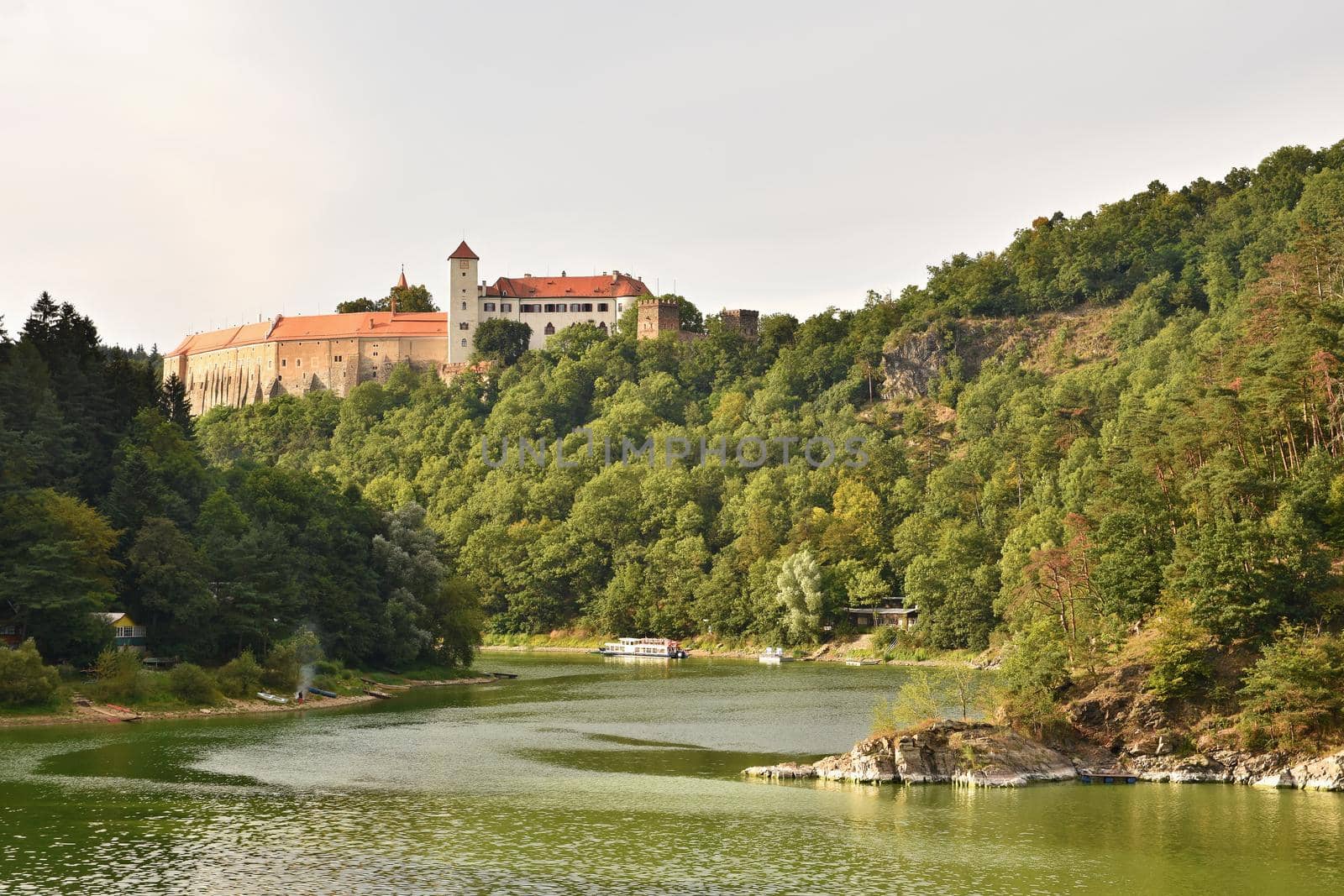 Beautiful old castle Bitov in the forest above the dam. Vranov dam. South Moravia - Czech Republic by Montypeter