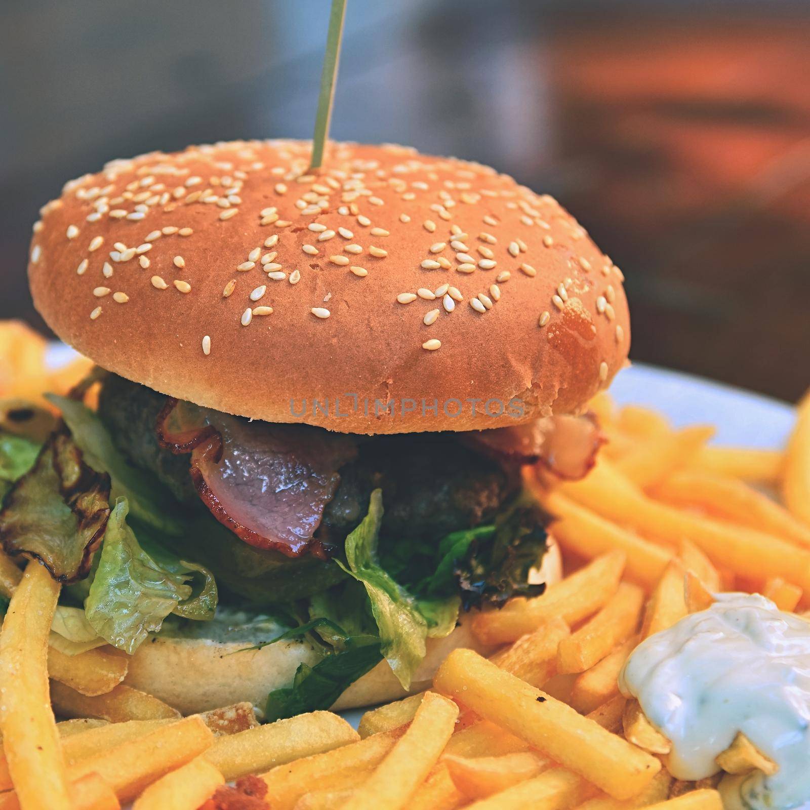 Hamburger with fries. 