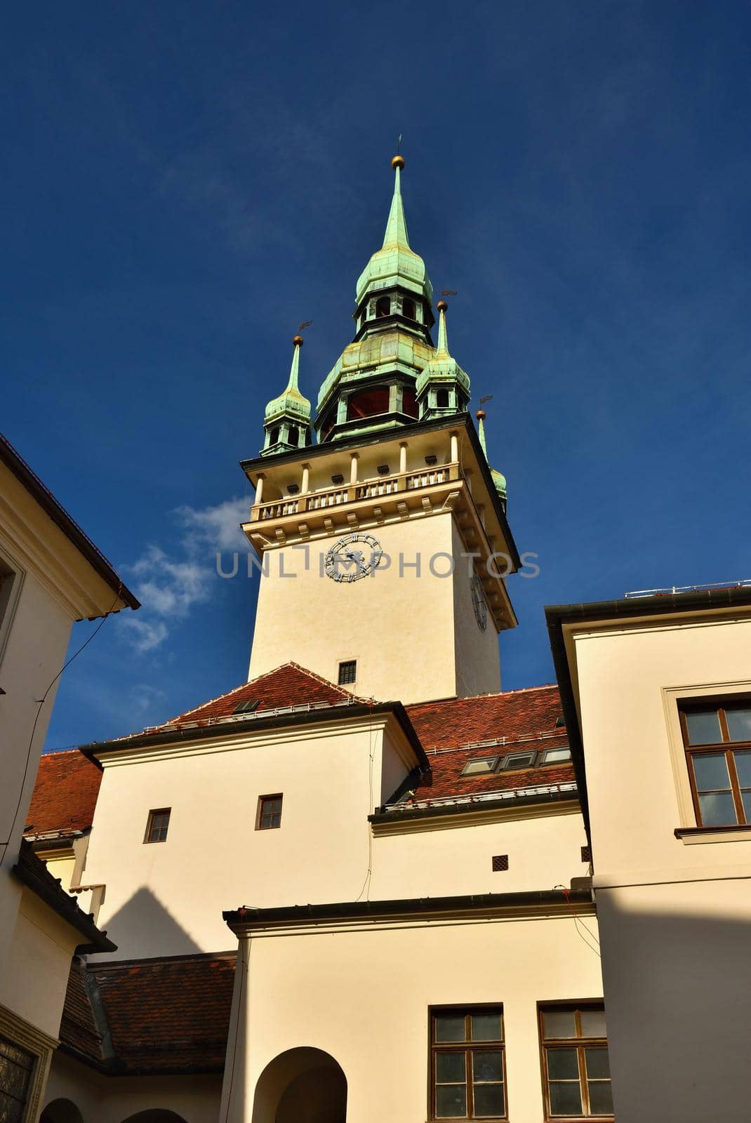 The city of Brno. - Czech Republic - Europe. Gate of the Old City Hall. A photo of the beautiful old architecture and tourist attraction with a lookout tower. Tourist Information Center. by Montypeter