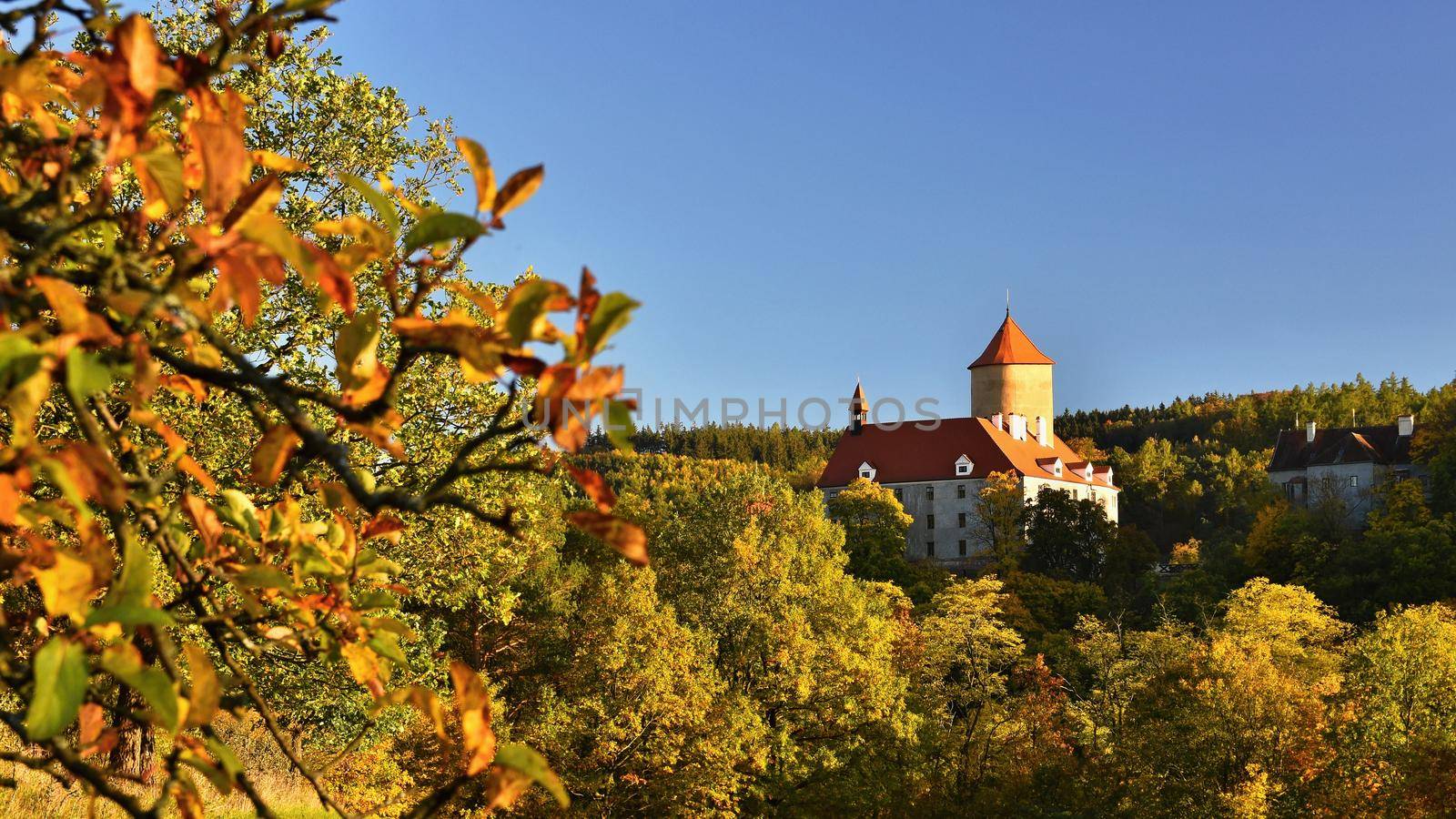 Beautiful Autumn Landscape with Veveri Castle. Natural colorful scenery with sunset. Brno dam-Czech Republic-Europe. by Montypeter