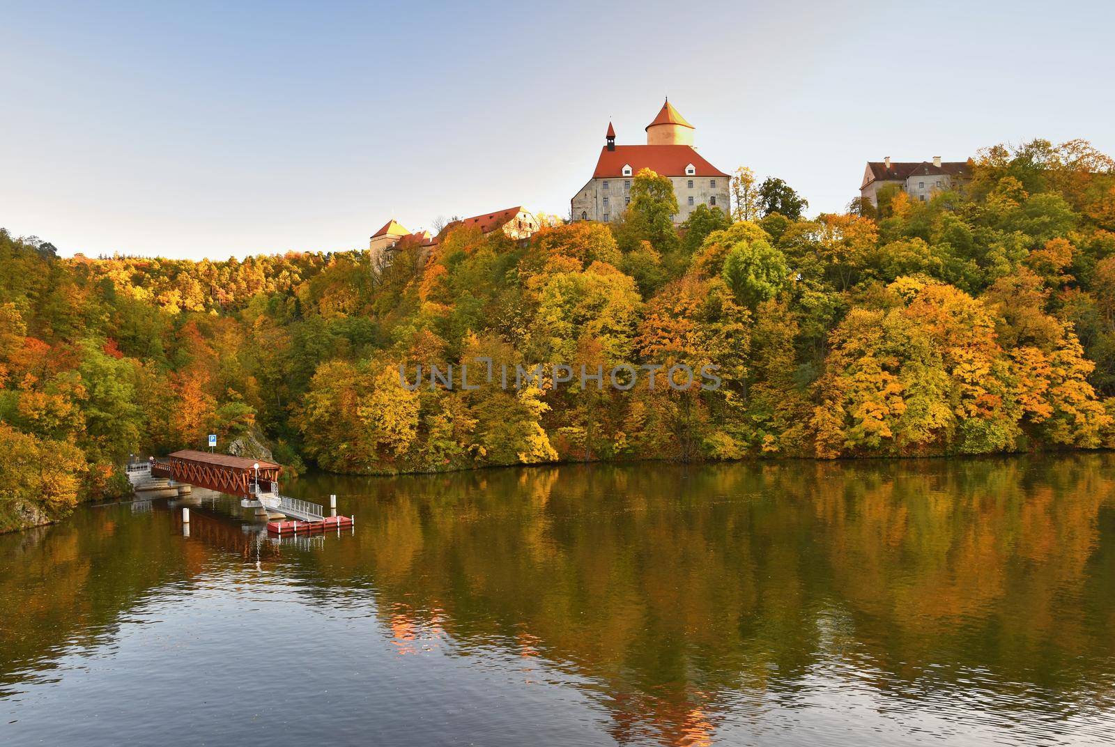 Beautiful Autumn Landscape with Veveri Castle. Natural colorful scenery with sunset. Brno dam-Czech Republic-Europe. by Montypeter