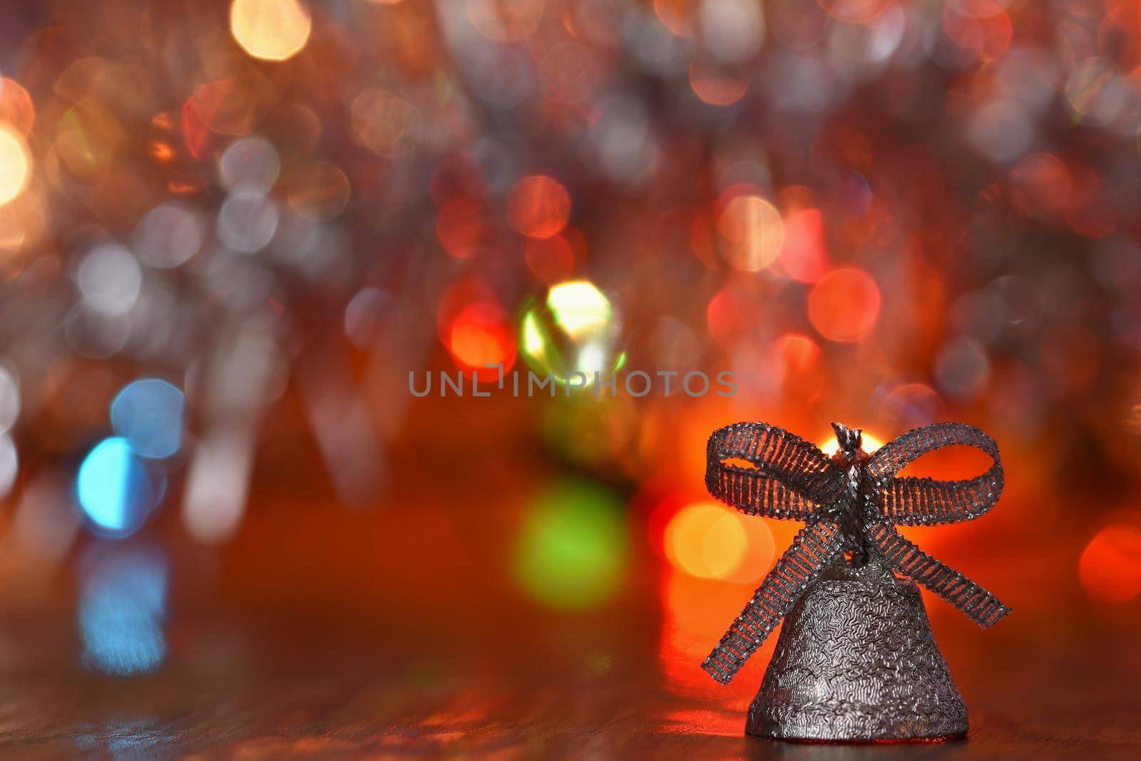 Christmas decorations. Beautiful Christmas tree ornaments on abstract, blurred colorful background. Concept for winter, holiday and snow. by Montypeter