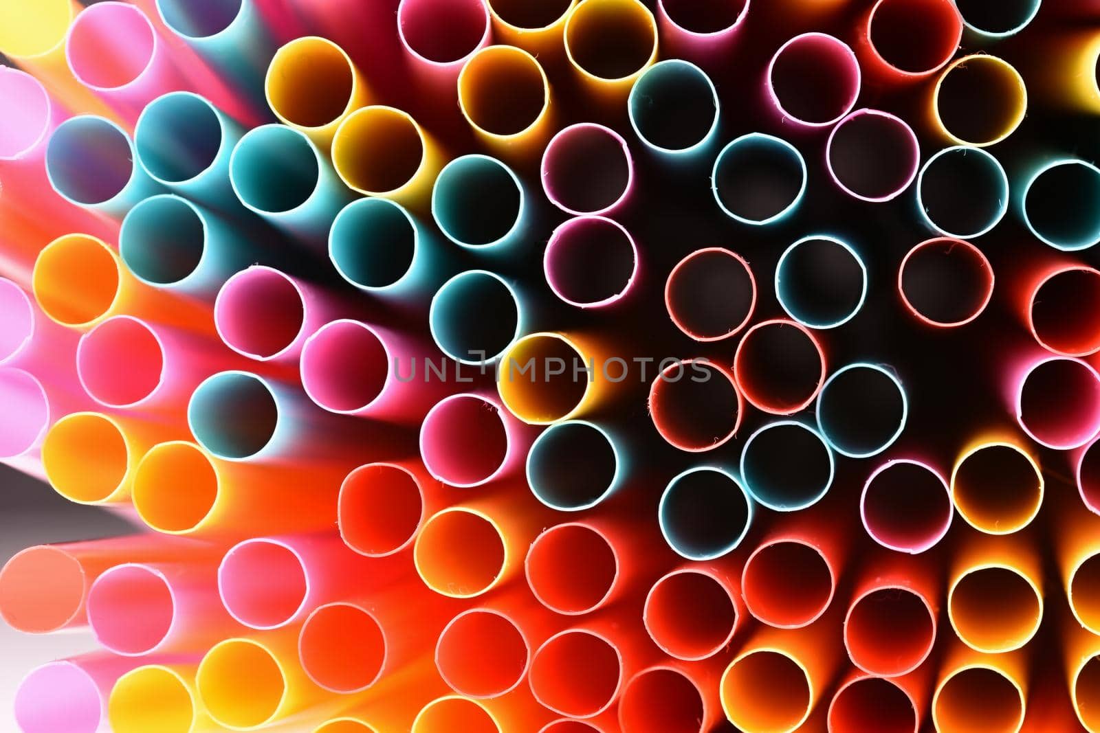 Straws. Macro abstract image with beautiful multi-colored background.