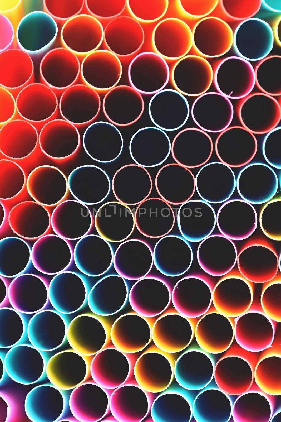 Straws. Macro abstract image with beautiful multi-colored background.