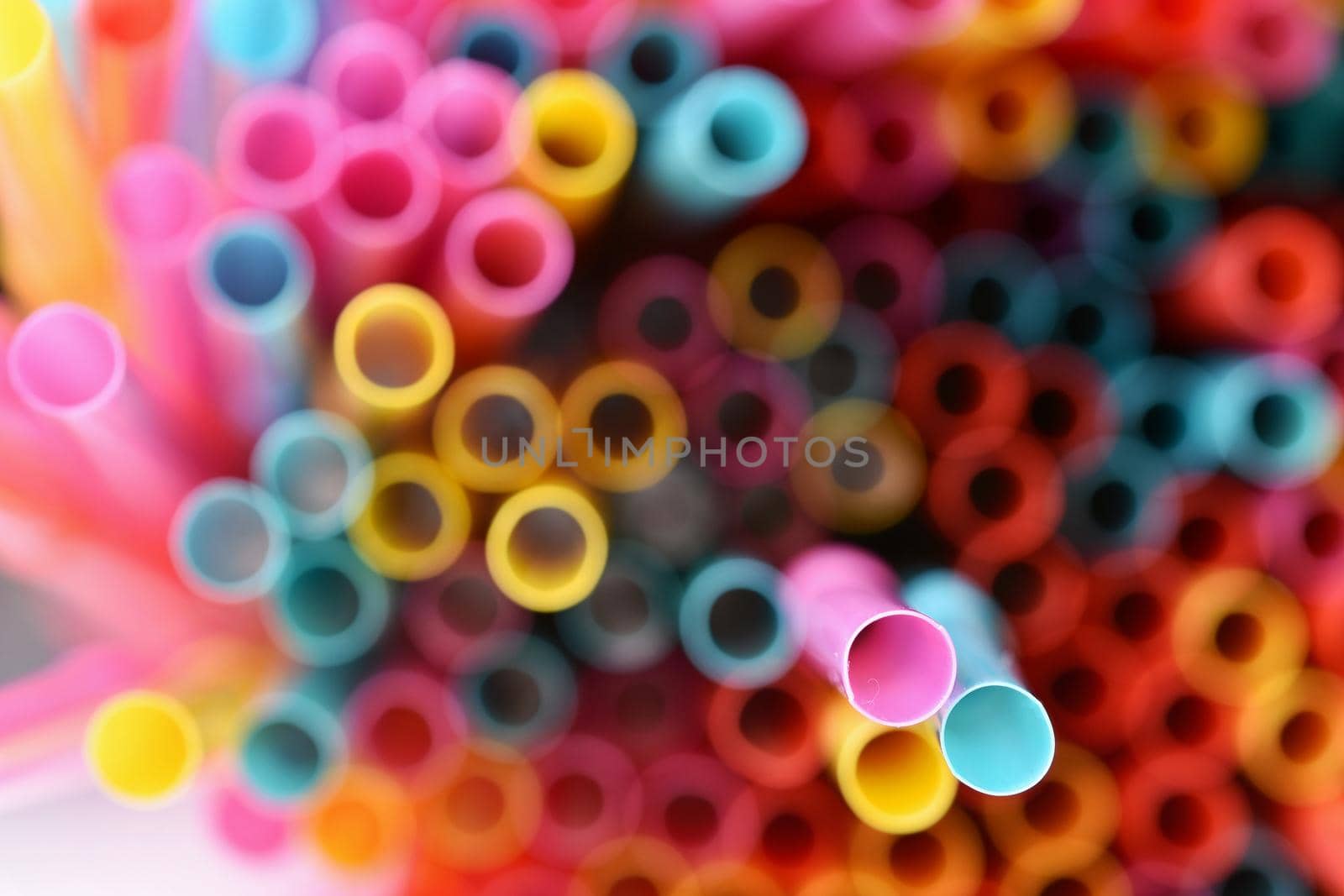 Straws. Macro abstract image with beautiful multi-colored background.