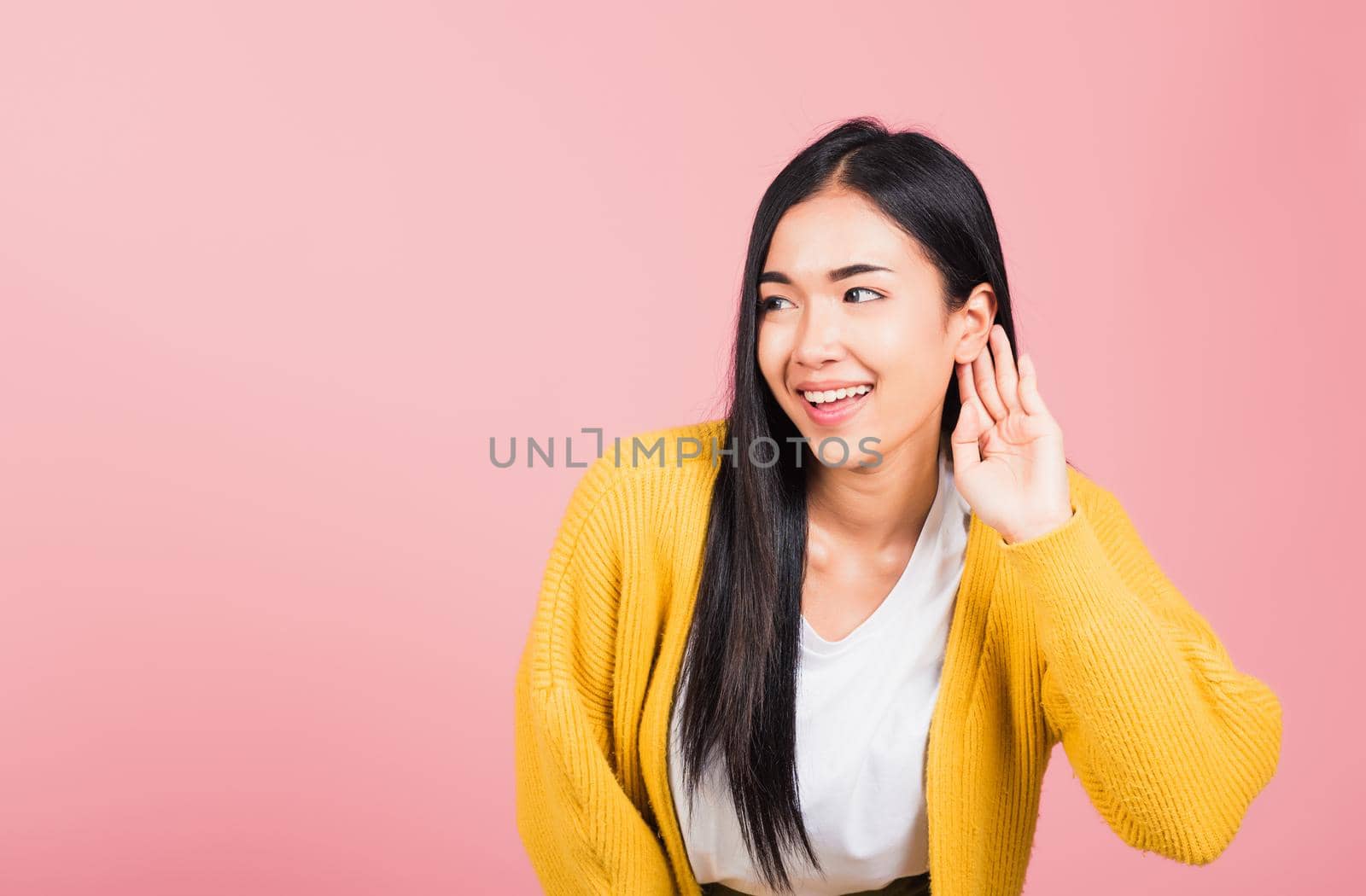 woman teen smiling overhearing listening sound to gossip by Sorapop