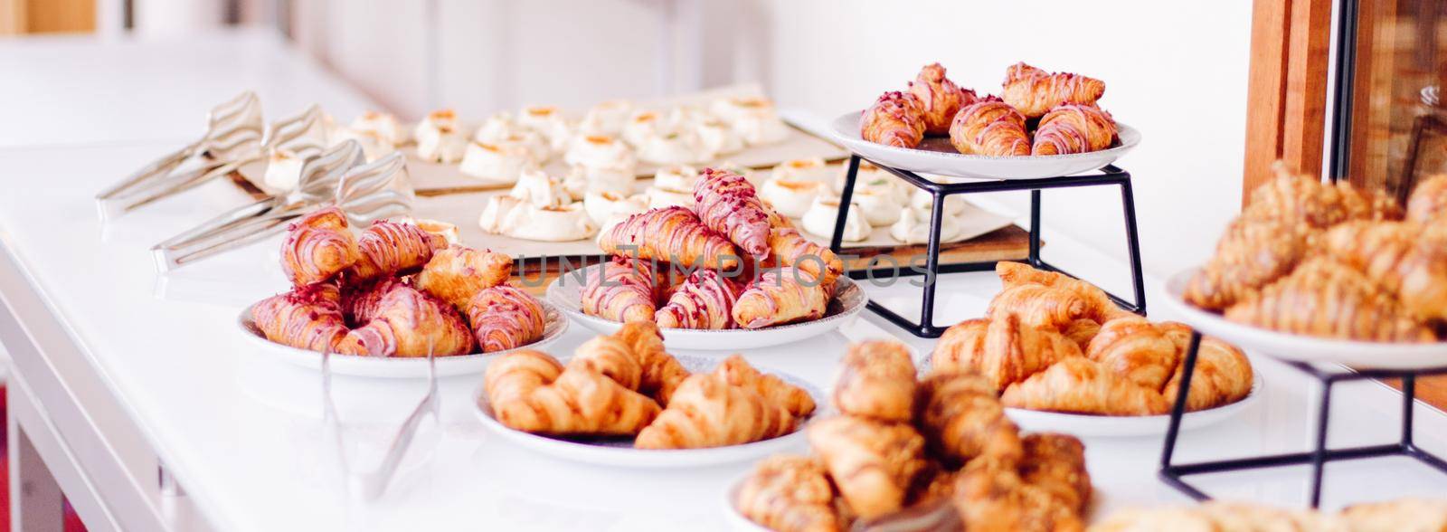 Pastry, cookies and croissants, sweet desserts served at charity event - food, drinks and menu concept as holiday background banner for luxury brand design