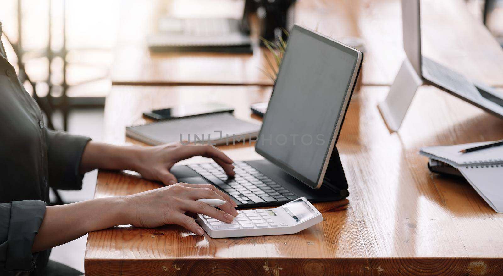 Close up view of bookkeeper or financial inspector hands making report, calculating or checking balance. Home finances, investment, economy, saving money or insurance concept