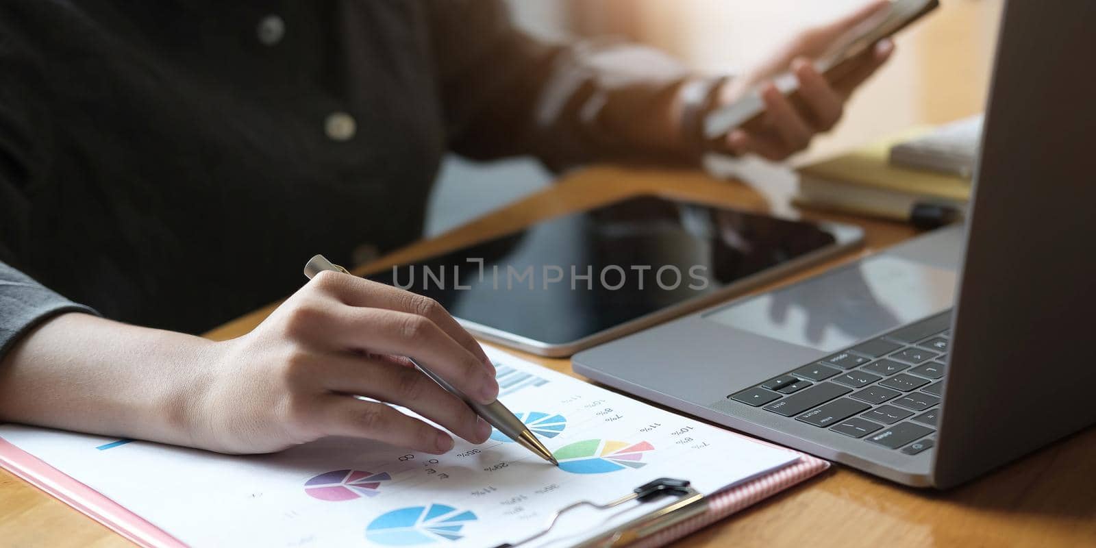 Business man investment consultant analyzing company annual financial report balance sheet statement working with documents graphs. Concept picture of business, market, office, tax..