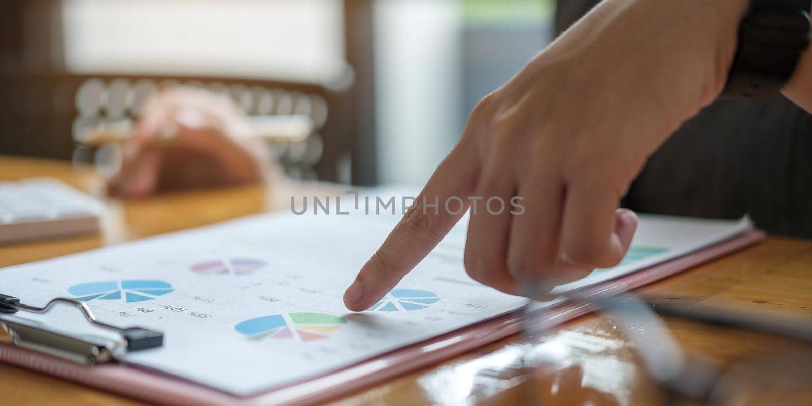 Businesswoman investment consultant analyzing company annual financial report balance sheet statement working with documents graphs. Concept picture of business, market, office, tax..