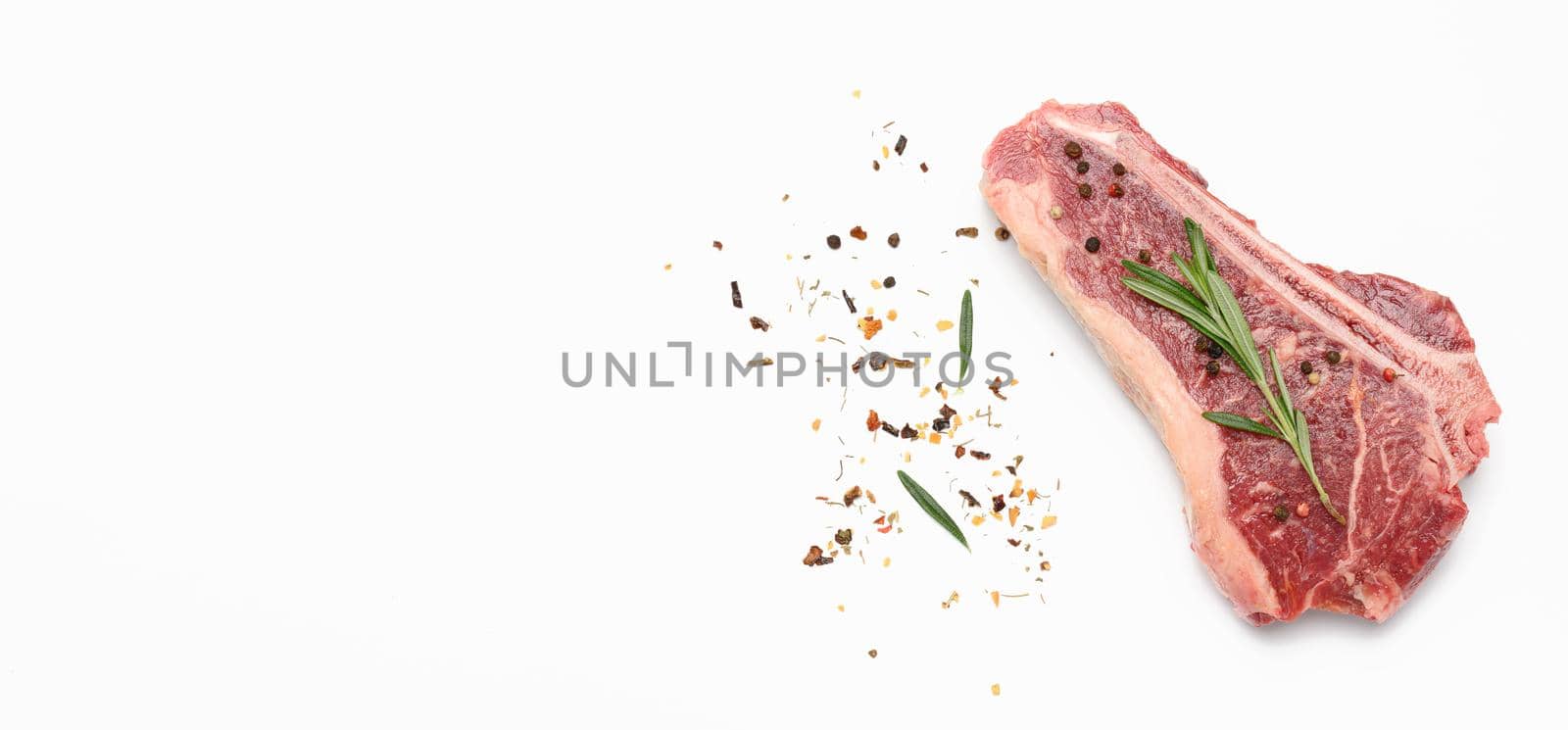 fresh raw piece of beef meat, striploin steak on white background, top view, copy space