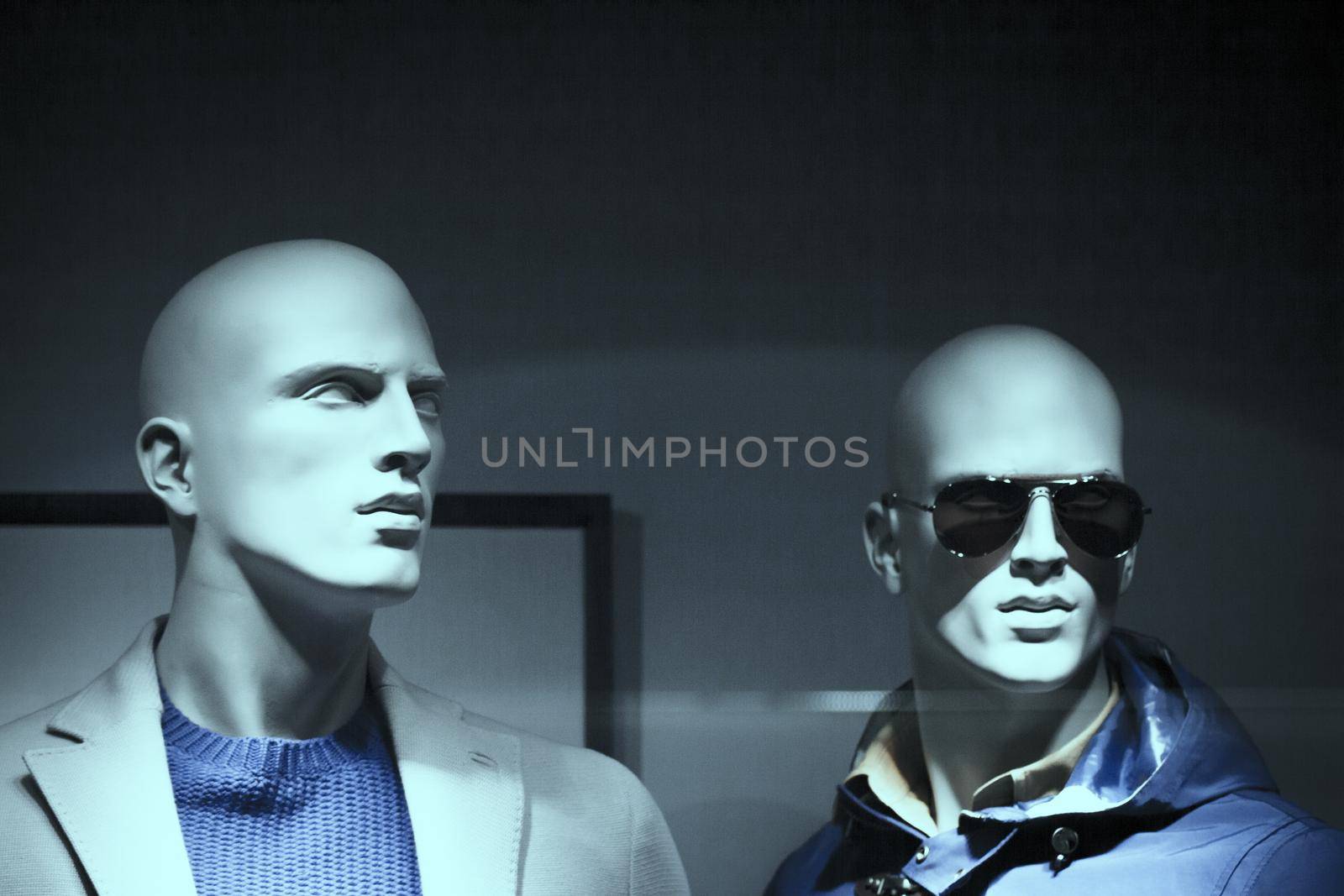 Portrait of a male mannequin with mysterious expression. No people